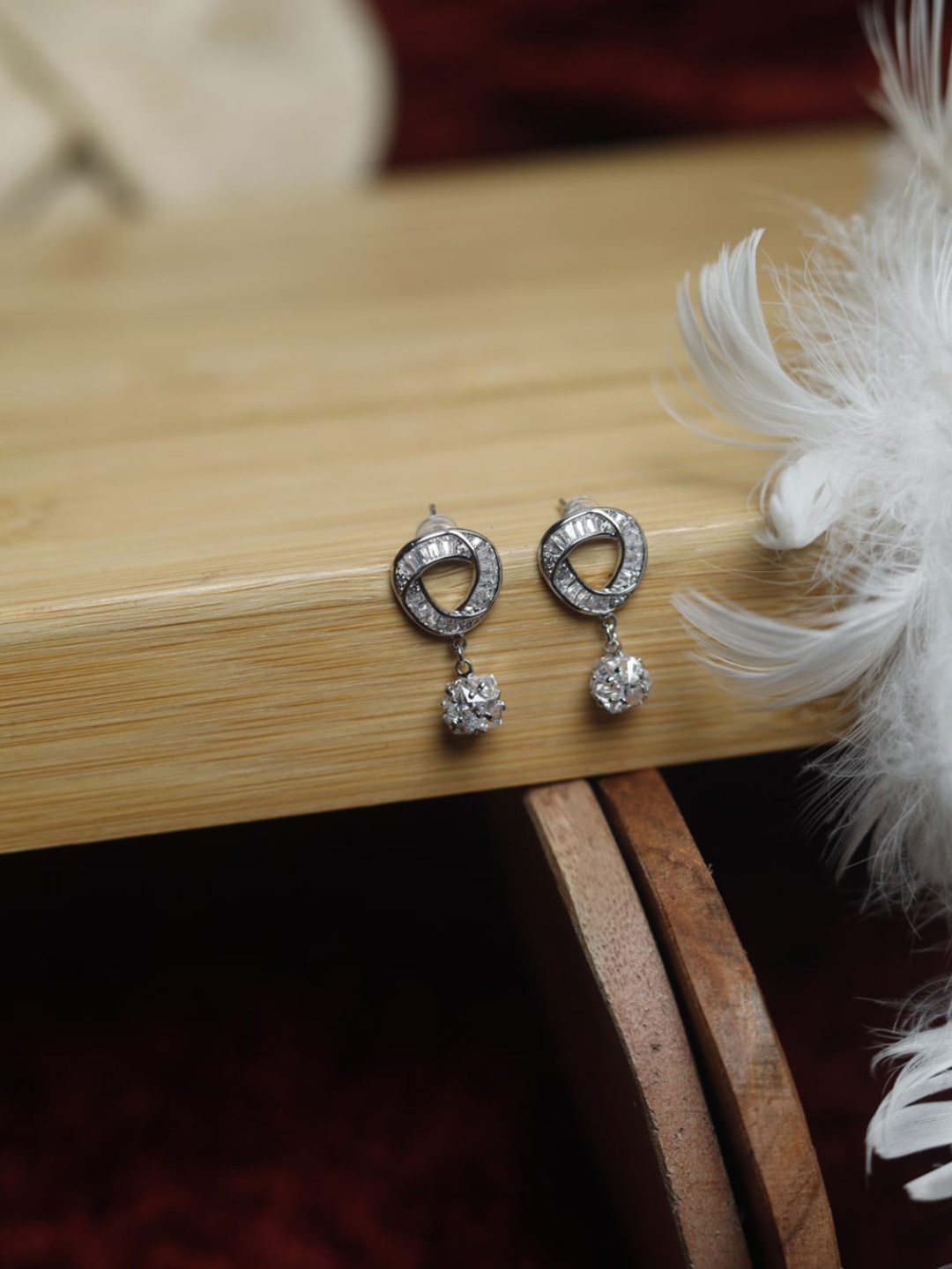 

Maansh Silver-Plated Contemporary Stone Studded Drop Earrings