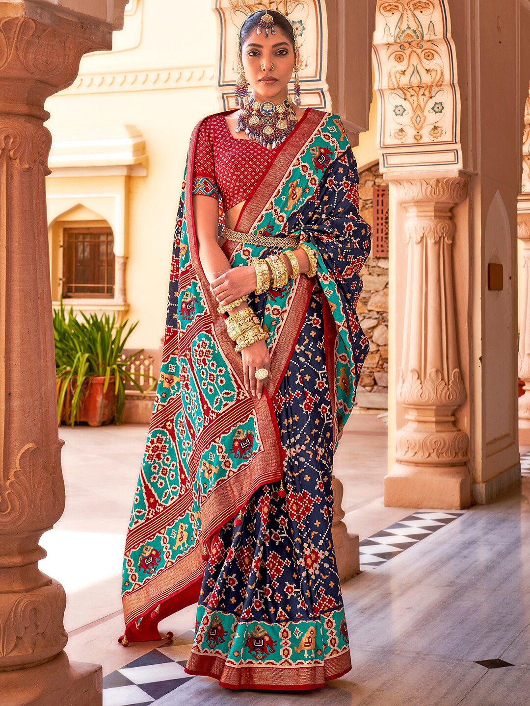 

Anouk Ethnic Motifs Woven Design Zari Patola Saree, Navy blue