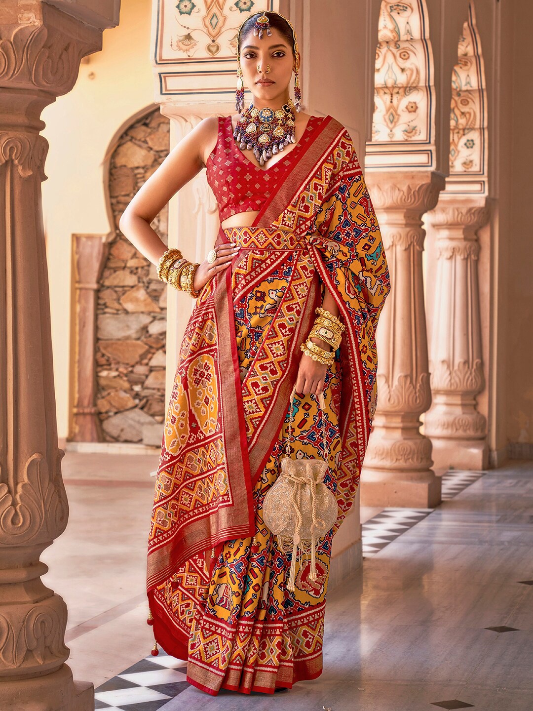 

Anouk Ethnic Motifs Woven Design Zari Patola Saree, Mustard