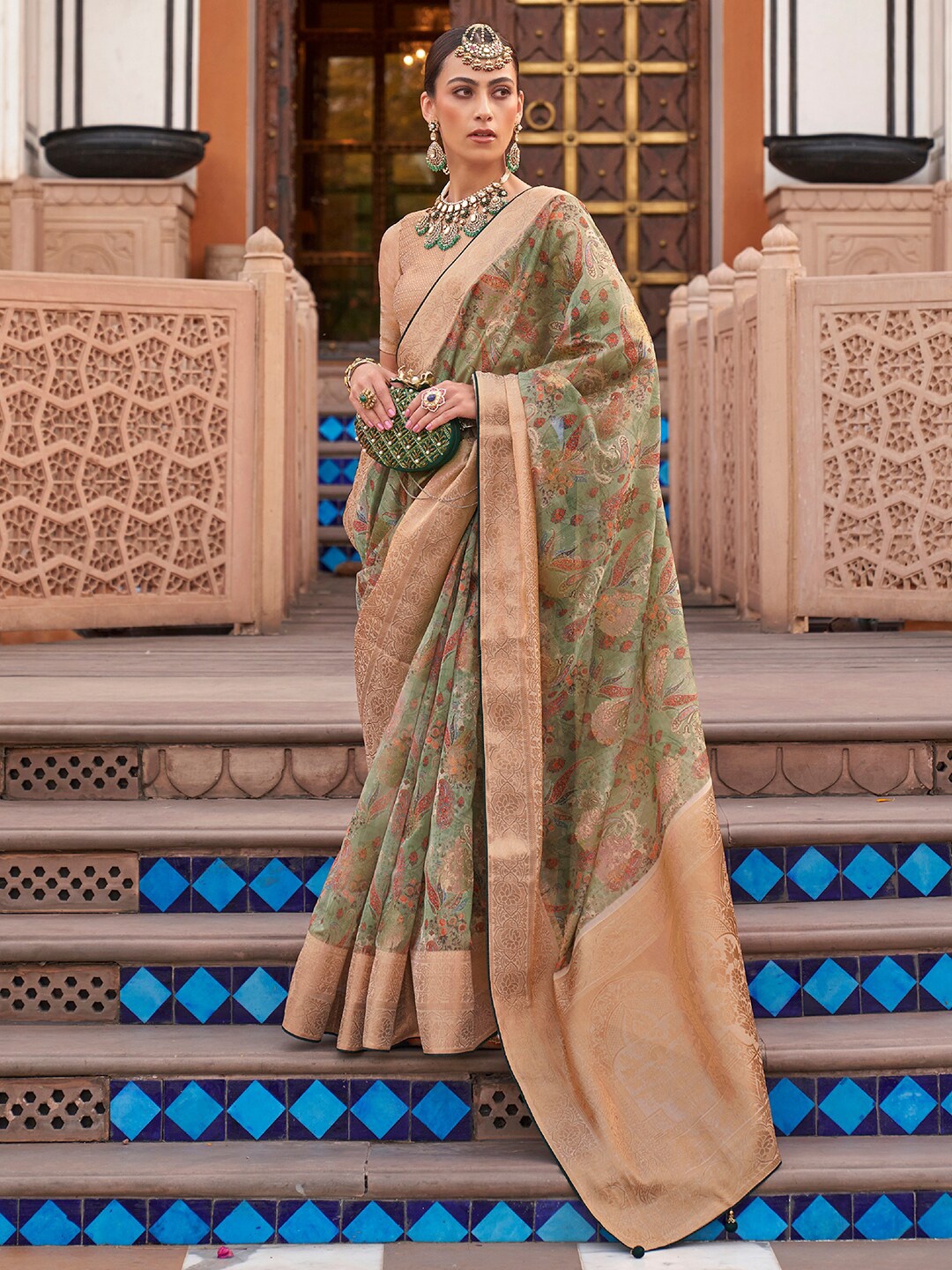 

Anouk Green & Brown Ethnic Motifs Woven Design Zari Organza Banarasi Saree
