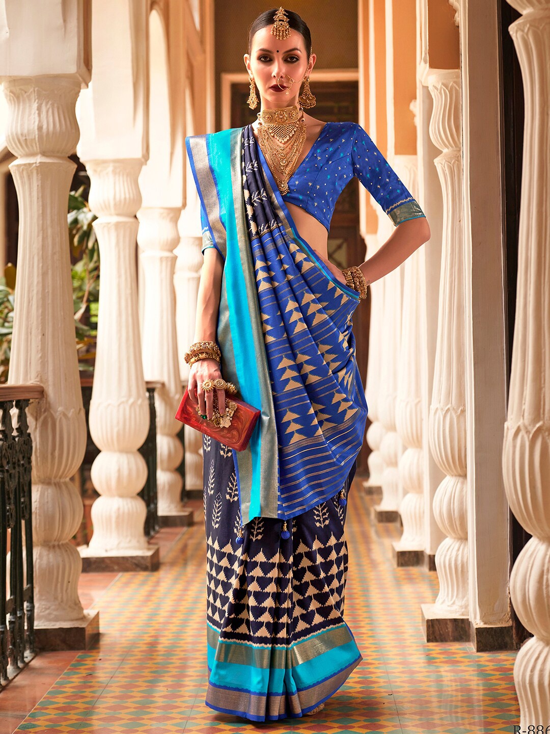 

Anouk Navy Blue & Gold-Toned Ethnic Motifs Woven Design Zari Ikat Saree