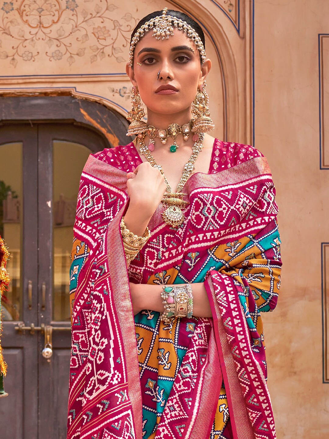 

Anouk Ethnic Motifs Woven Design Zari Patola Saree, Pink