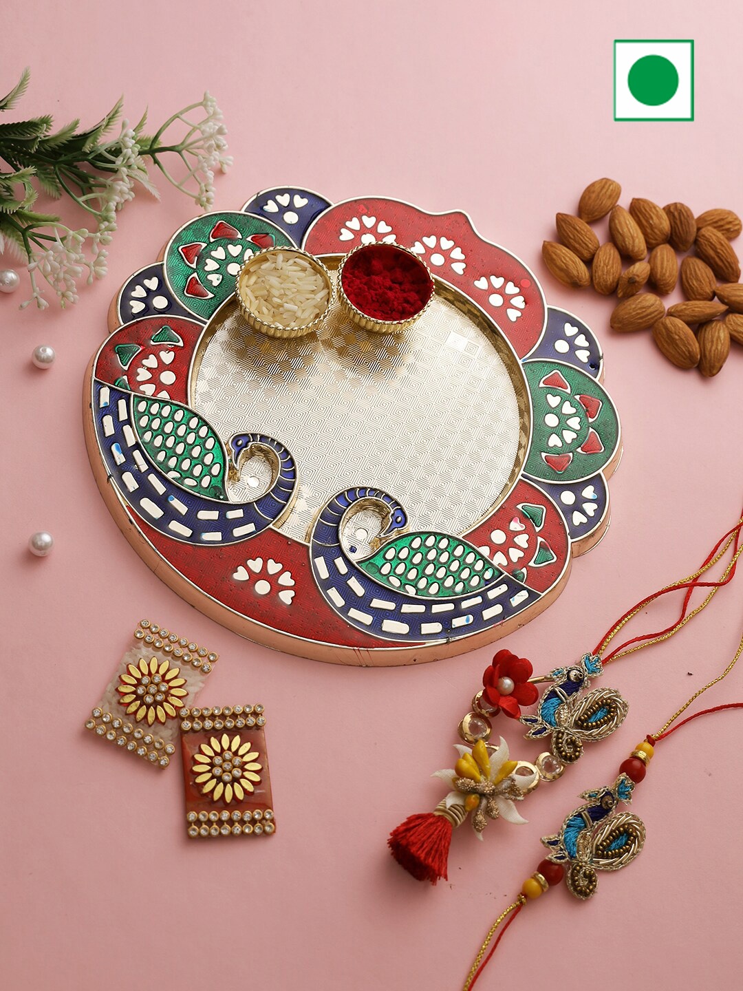 

Aapno Rajasthan Almond & Peacock Shape Kumkum Chawal Thali With Bhaiya Bhabhi Rakhi 200 g, Red