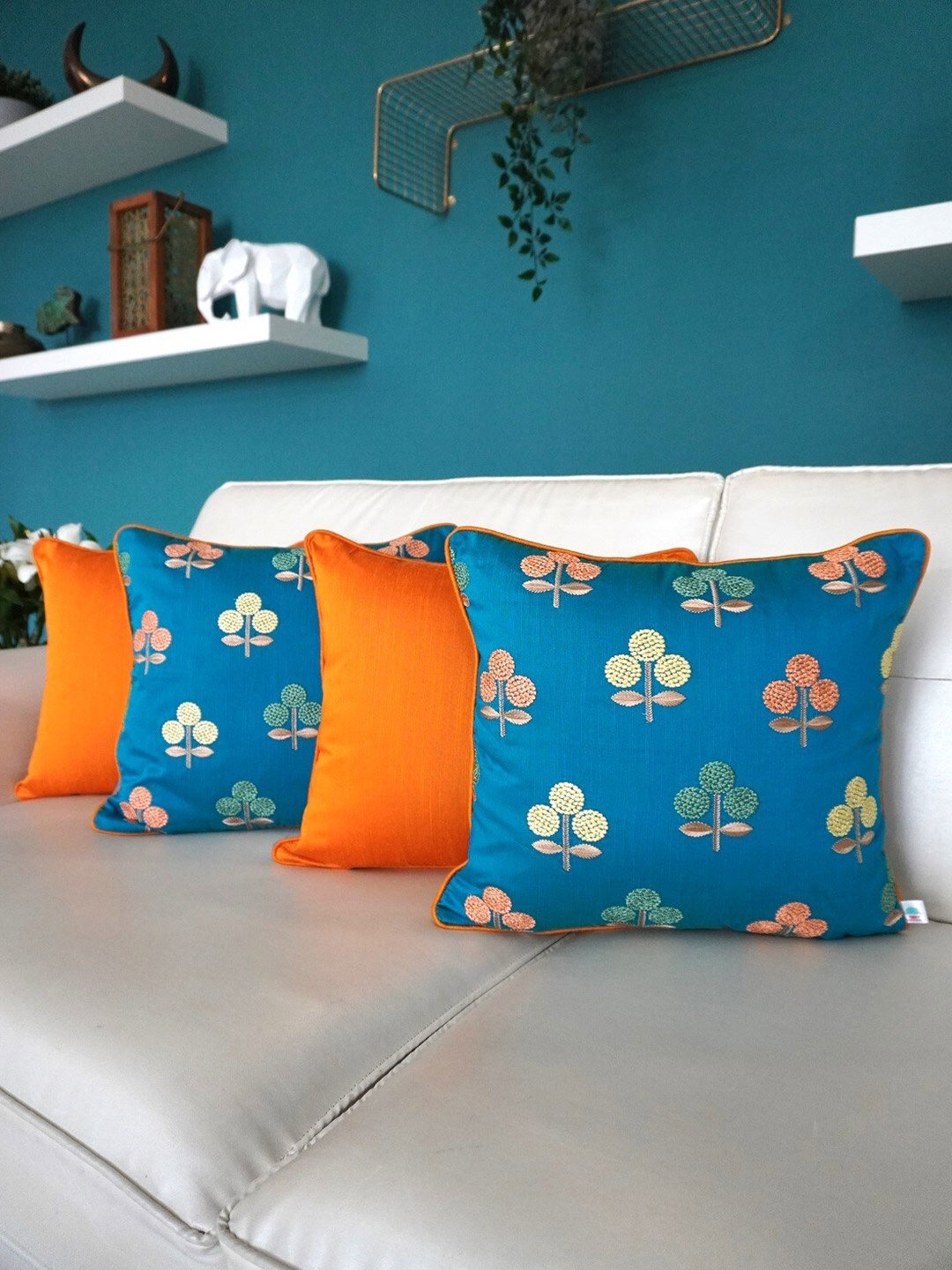 

TARA- Sparkling Homes Blue & Orange 4 Pieces Floral Embroidered Square Cushion Covers