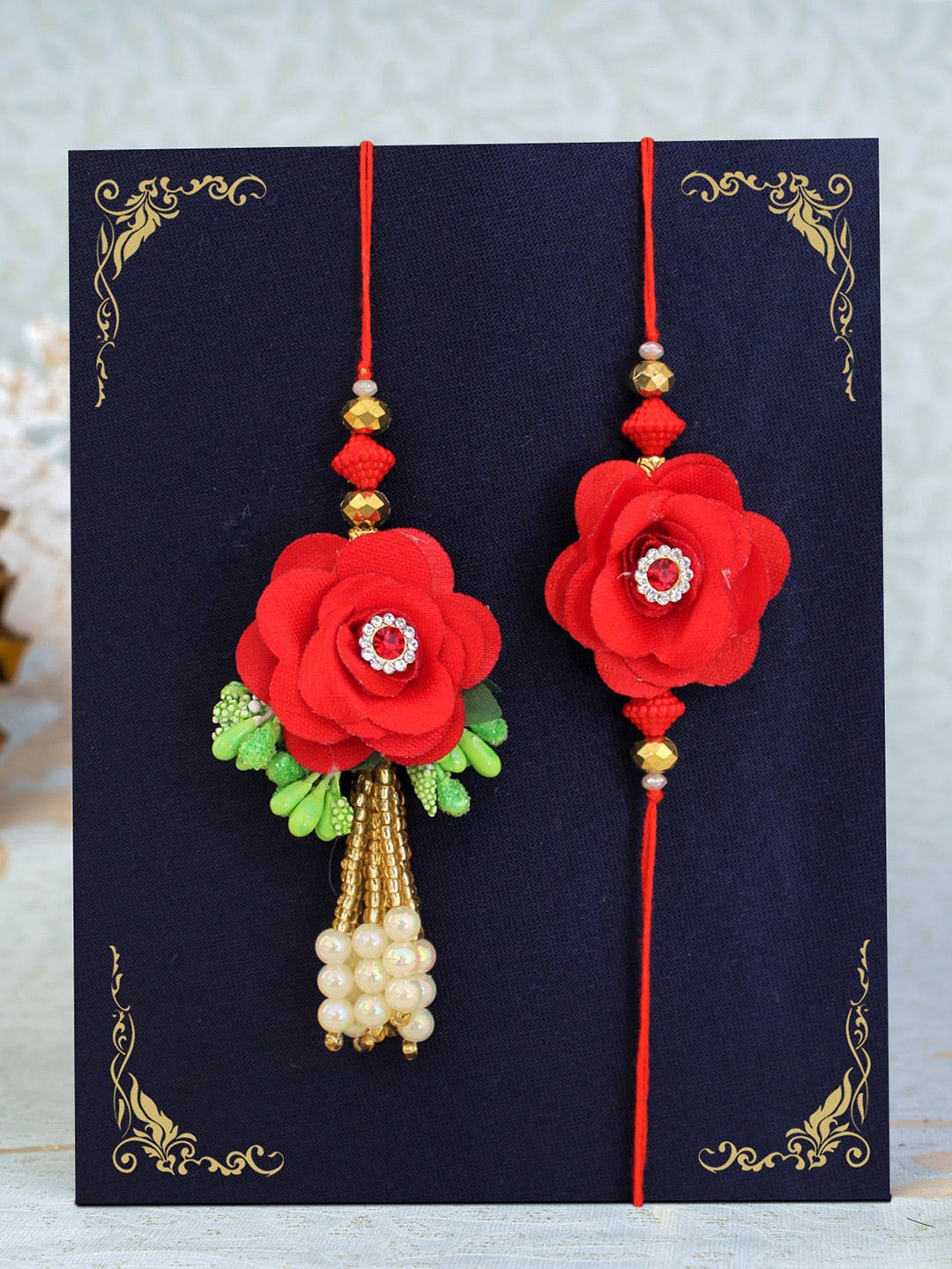 

TIED RIBBONS Set Of 2 Bhaiya Bhabhi Rakhis, Red