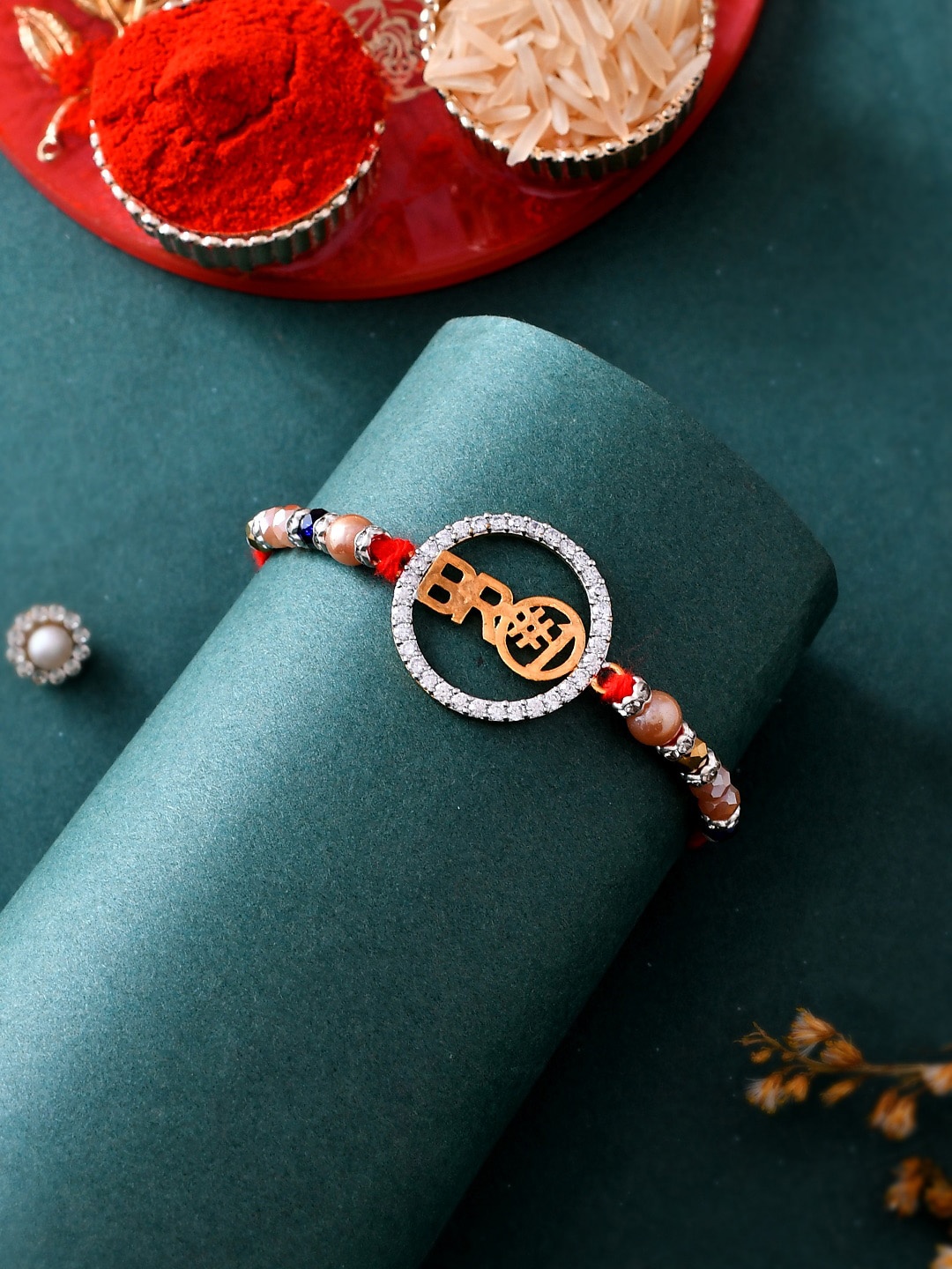 

Aapno Rajasthan Stone Studded Bro Thread Rakhi, Gold