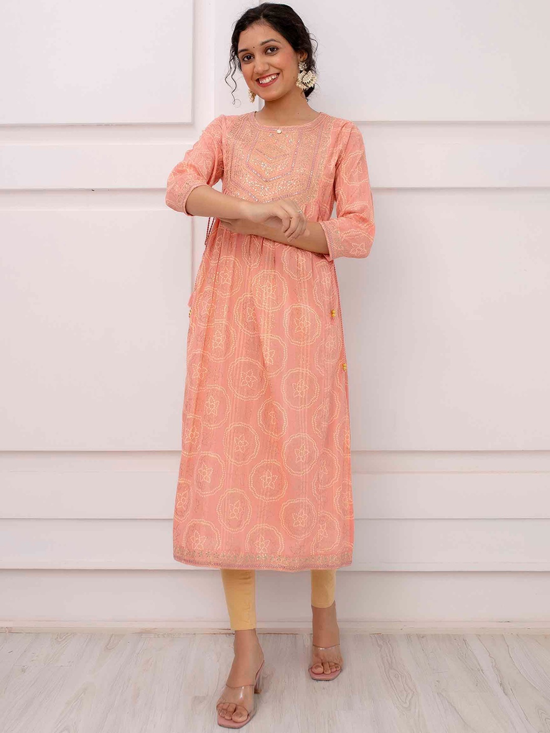 

KALINI Bandhani Printed Pleated Sequinned Cotton Kurta, Peach