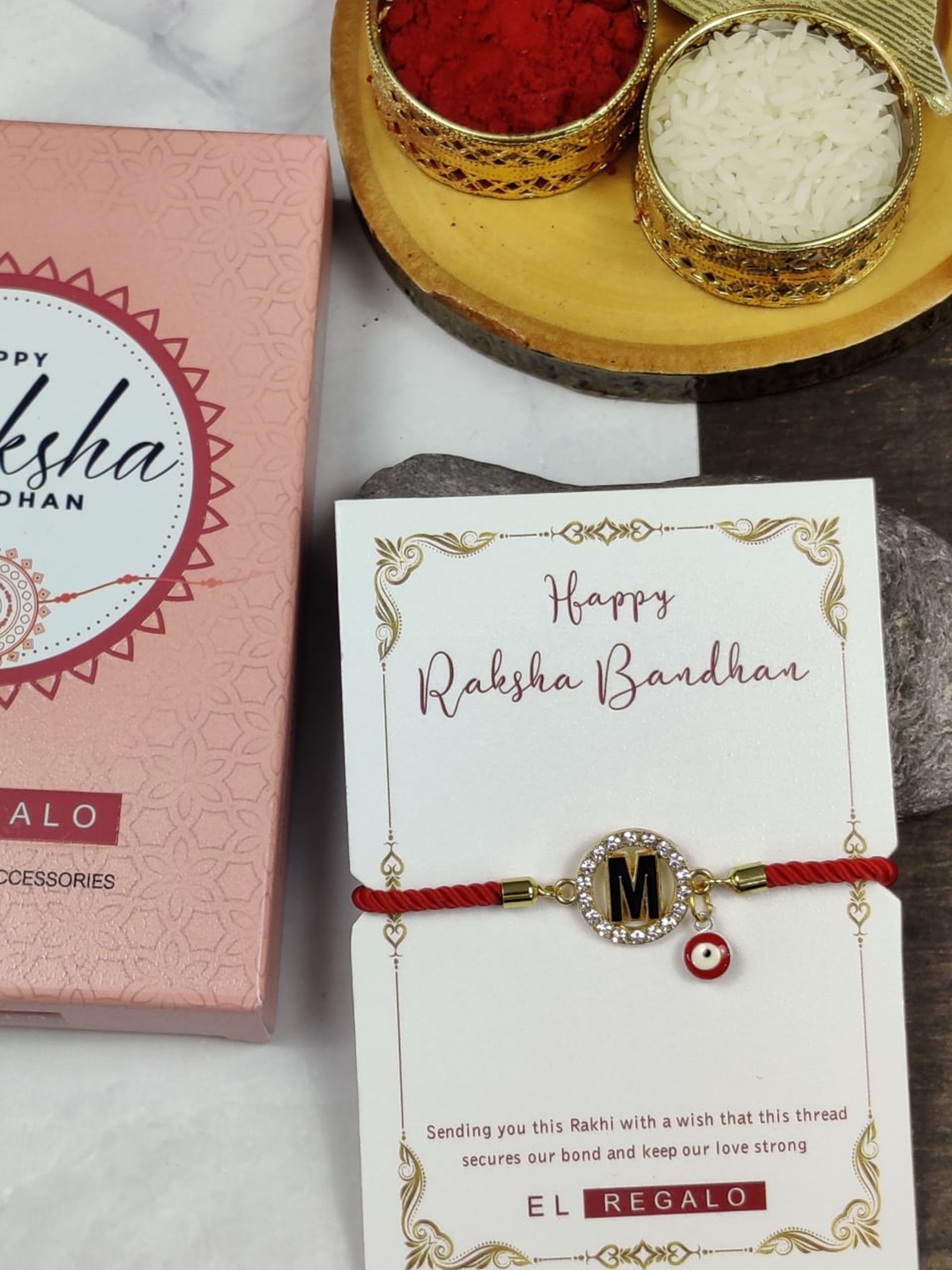 

EL REGALO M Name Letter Evil Eye Rakhi for Bhai, Red