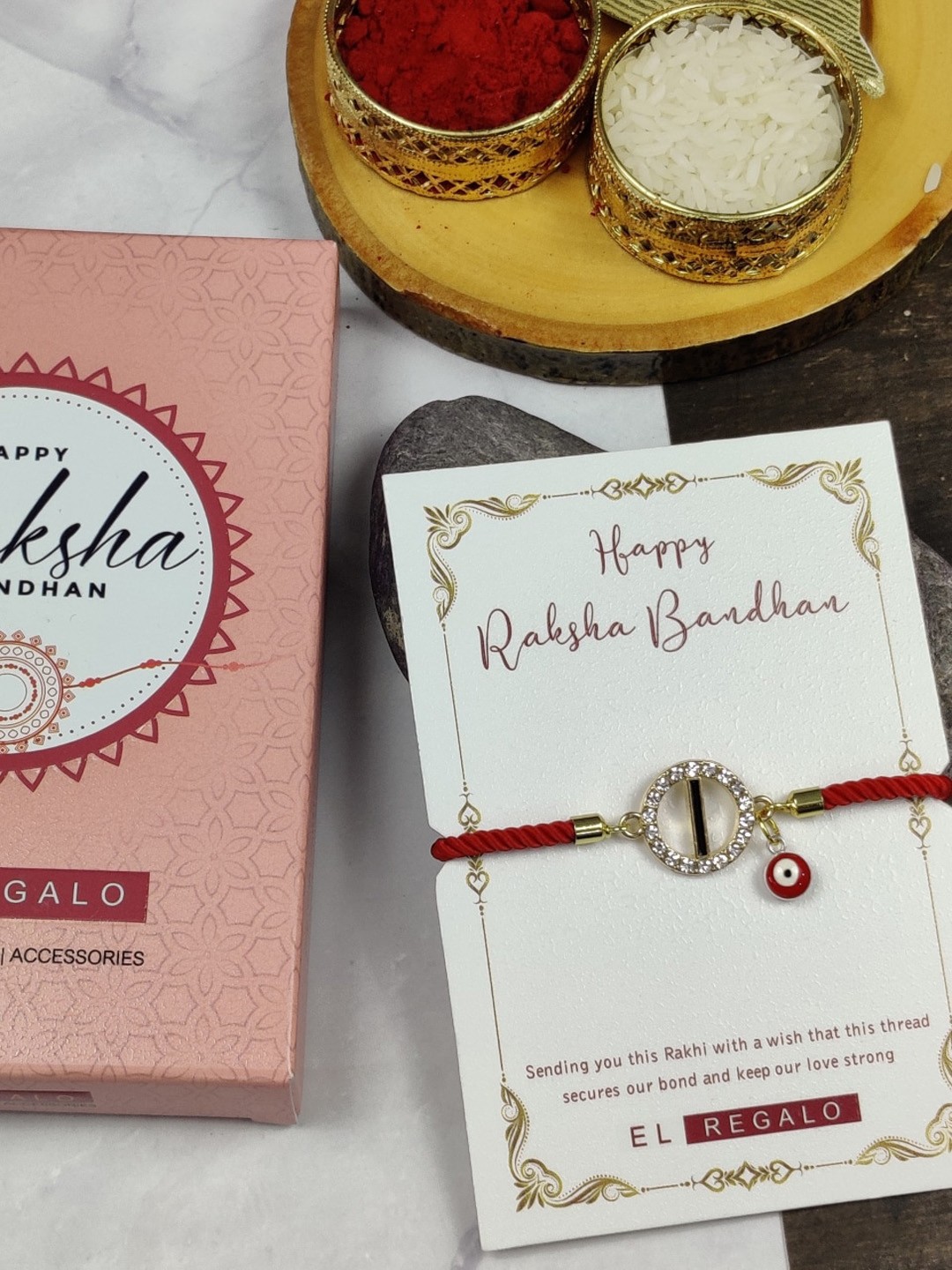 

EL REGALO Unisex I Name Initial Evil Eye Rakhi With Roli chawal Card, Red