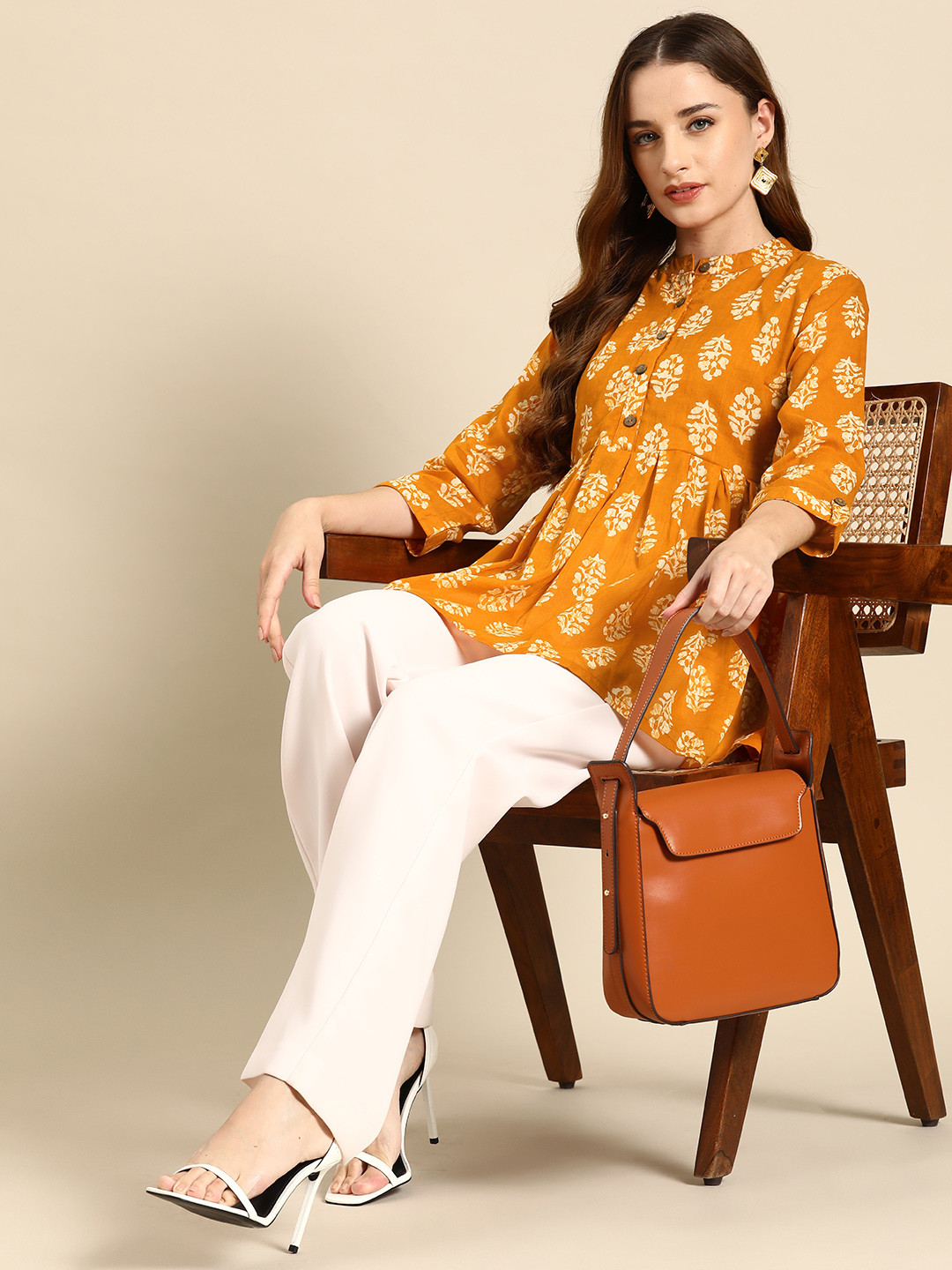 

Anouk Ethnic Motifs Printed Mandarin Collar Pure Cotton Pleated Kurti, Mustard