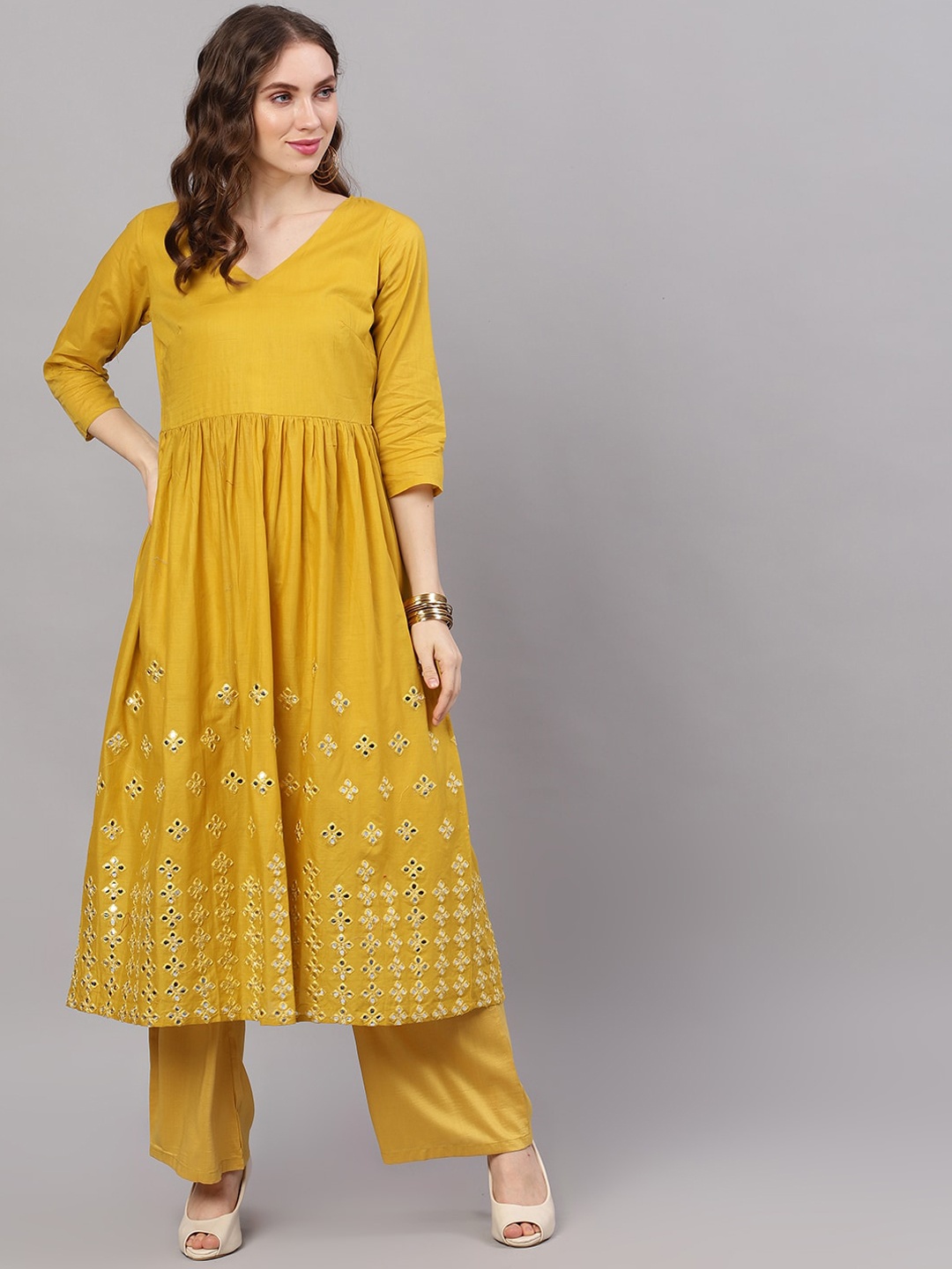 

AKS Embellished Mirror Work V-Neck Anarkali Cotton Kurta, Mustard
