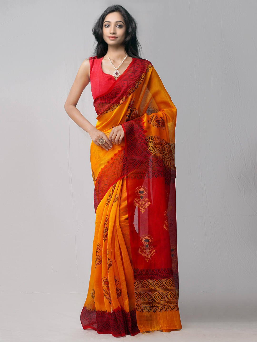 

Unnati Silks Ethnic Motifs Block Print Net Saree, Orange