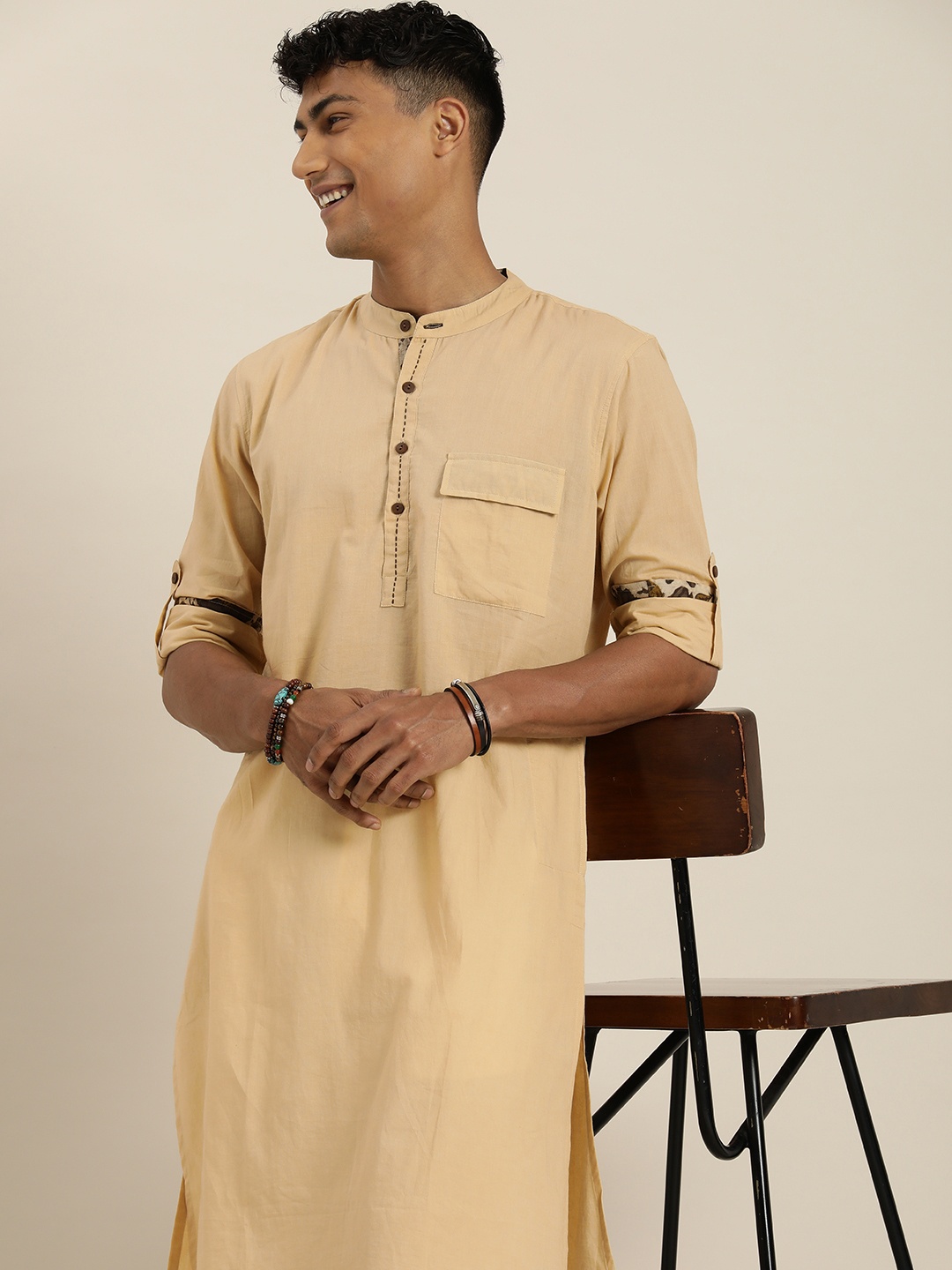 

Taavi Men Solid Regular Pure Cotton Kurta with Pyjamas, Beige