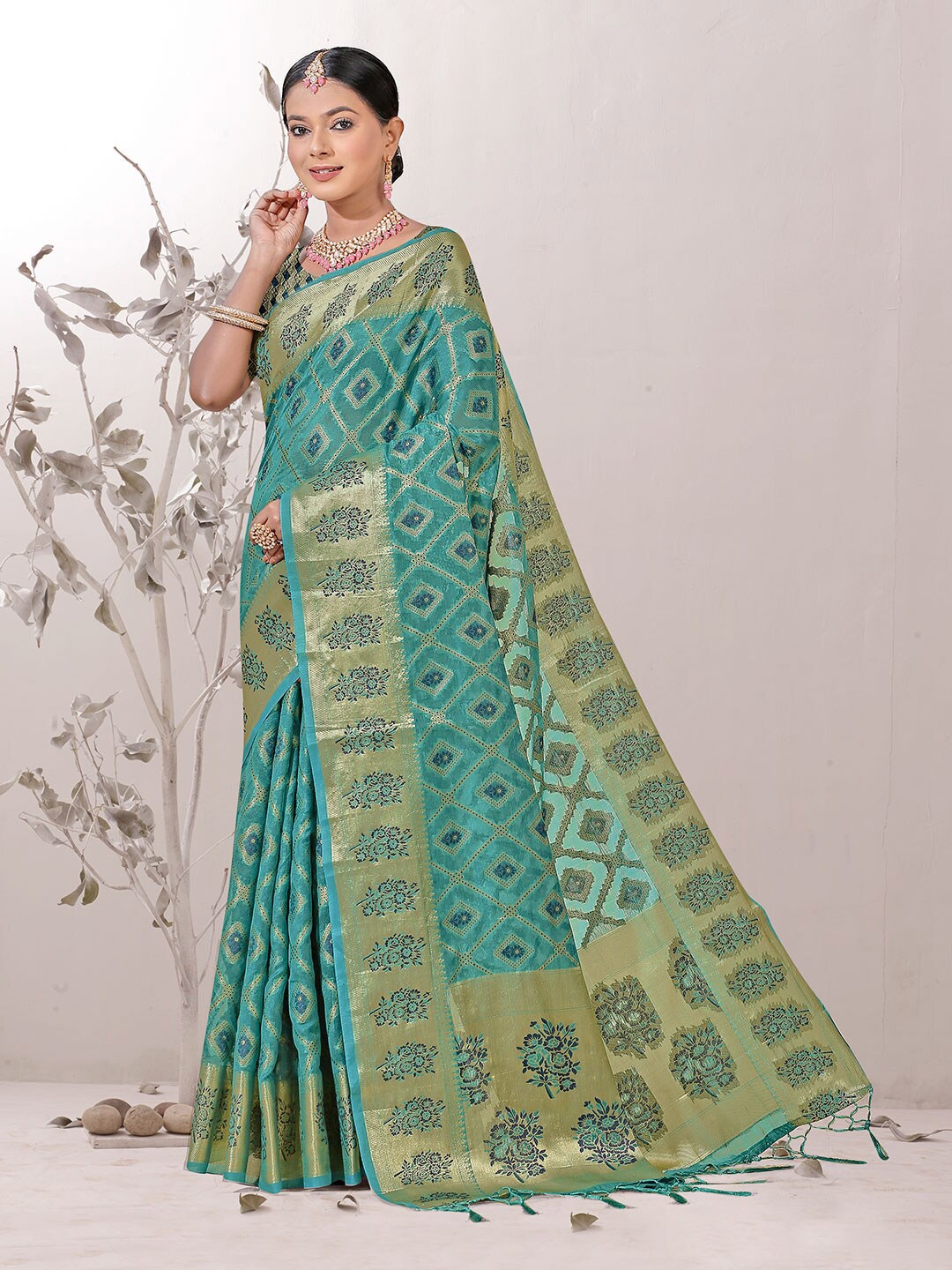 

Anouk Turquoise Blue Geometric Woven Design Zari Organza Saree