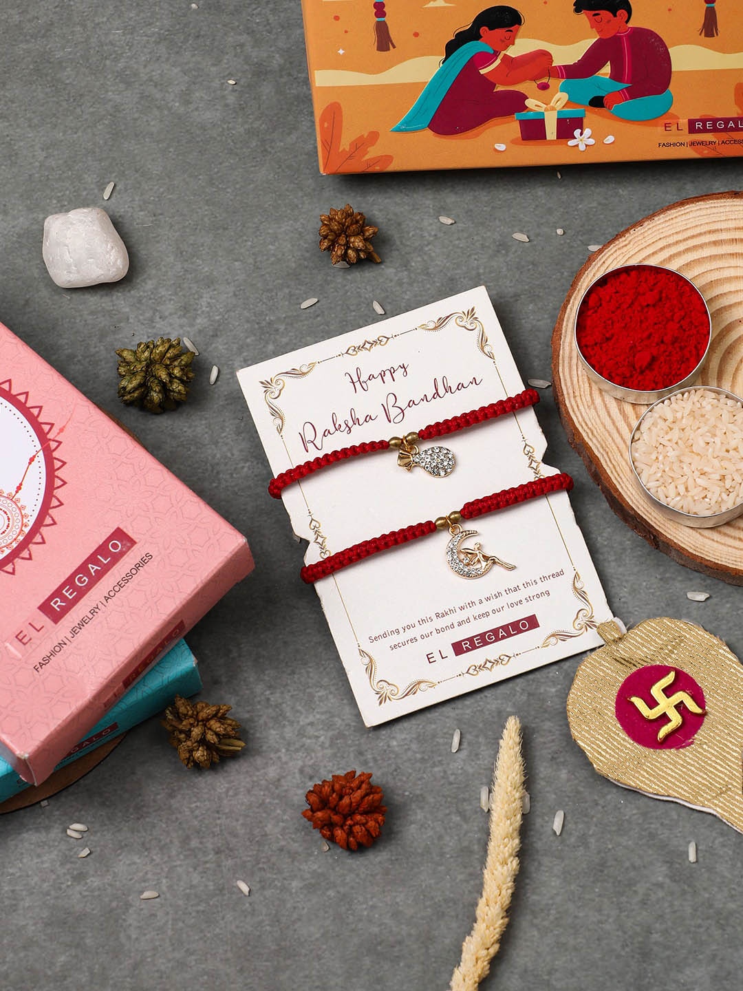 

EL REGALO Set Of 2 Stone-Studded Charm Rakhi With Roli & Chawal & Card, Red
