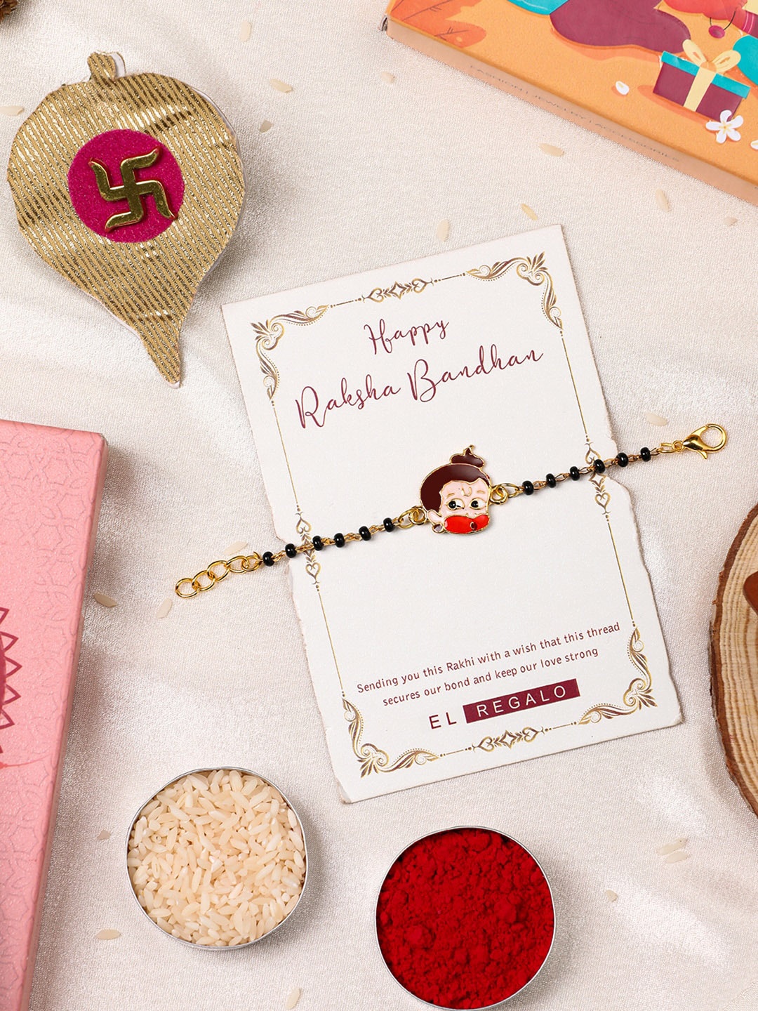 

EL REGALO Kids Lord Hanuman Charm Rakhi With Greeting Card Roli & Chawal, Gold