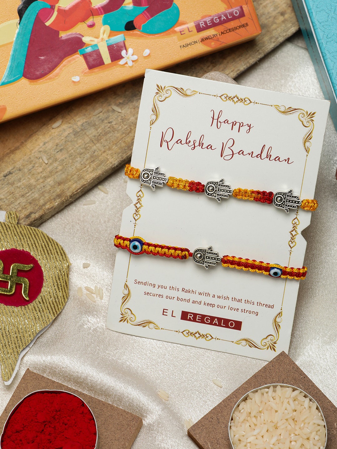 

EL REGALO Set Of 2 Stone-Studded Charm Rakhi With Roli & Chawal & Card, Silver