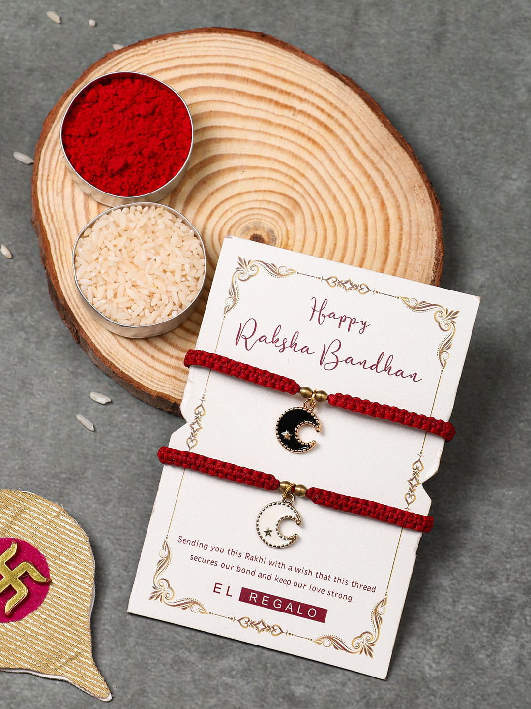 

EL REGALO Set Of 2 Charm Detail Rakhis With Roli & Chawal, Red
