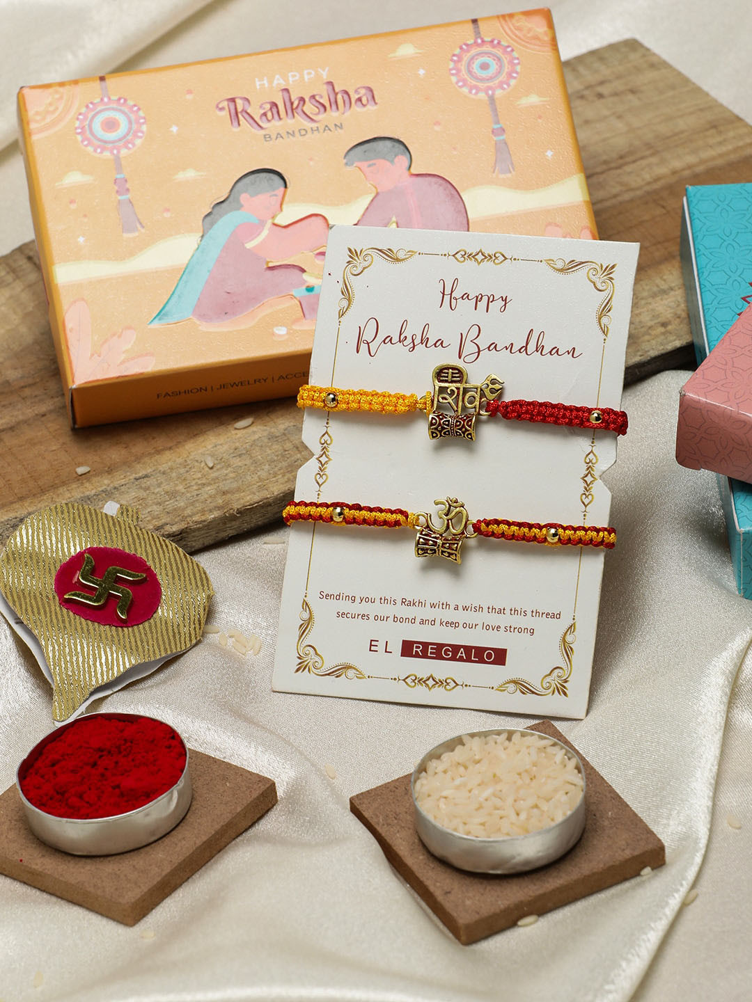 

EL REGALO Unisex Set Of 2 Charm Detail Rakhis With Roli & Chawal, Gold