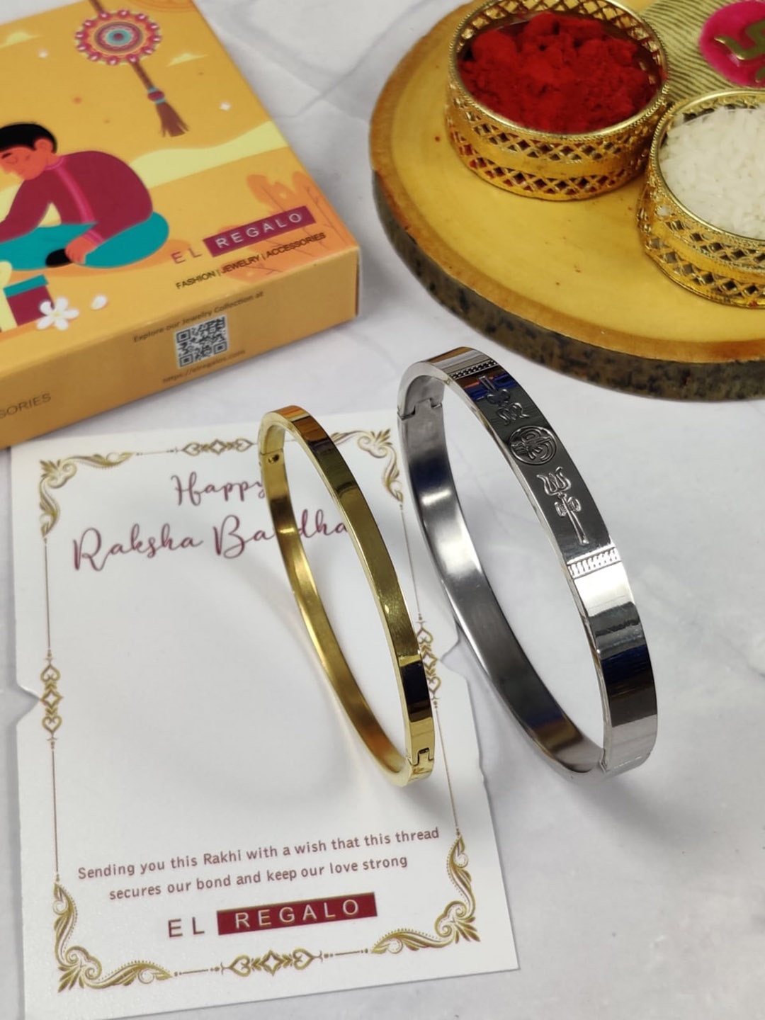 

EL REGALO Bhaiya Bhabhi Set Of 2 Band Stainless Steel Rakhi, Gold