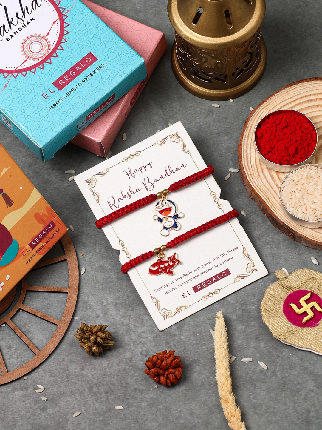 

EL REGALO Kids Set Of 2 Charm Detail Rakhis With Roli & Chawal, Red