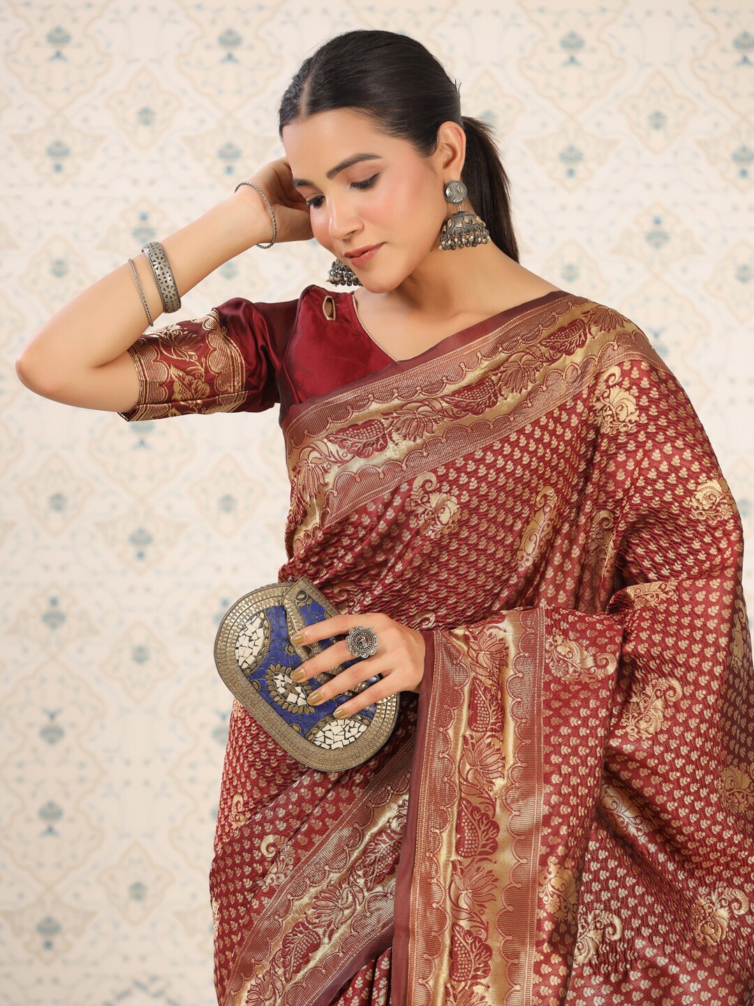 

Ode by House of Pataudi Maroon & Gold-Toned Ethnic Motifs Woven Design Zari Banarasi Saree