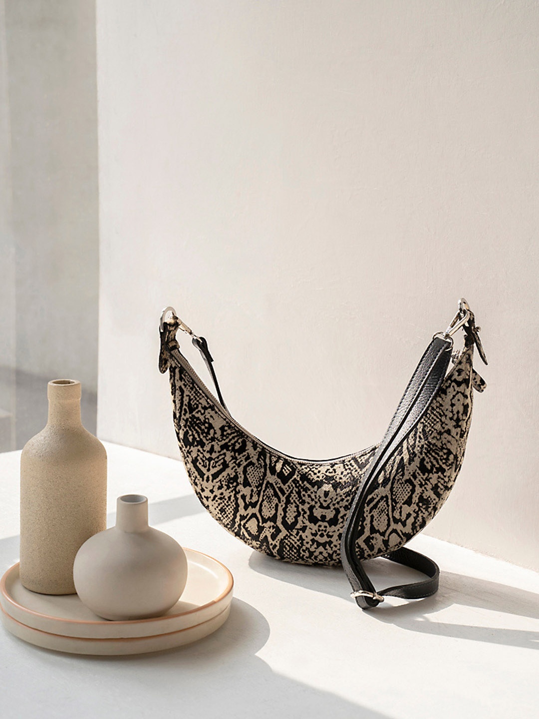 

Mistry Abstract Printed Leather Half Moon Hobo Bag, Grey