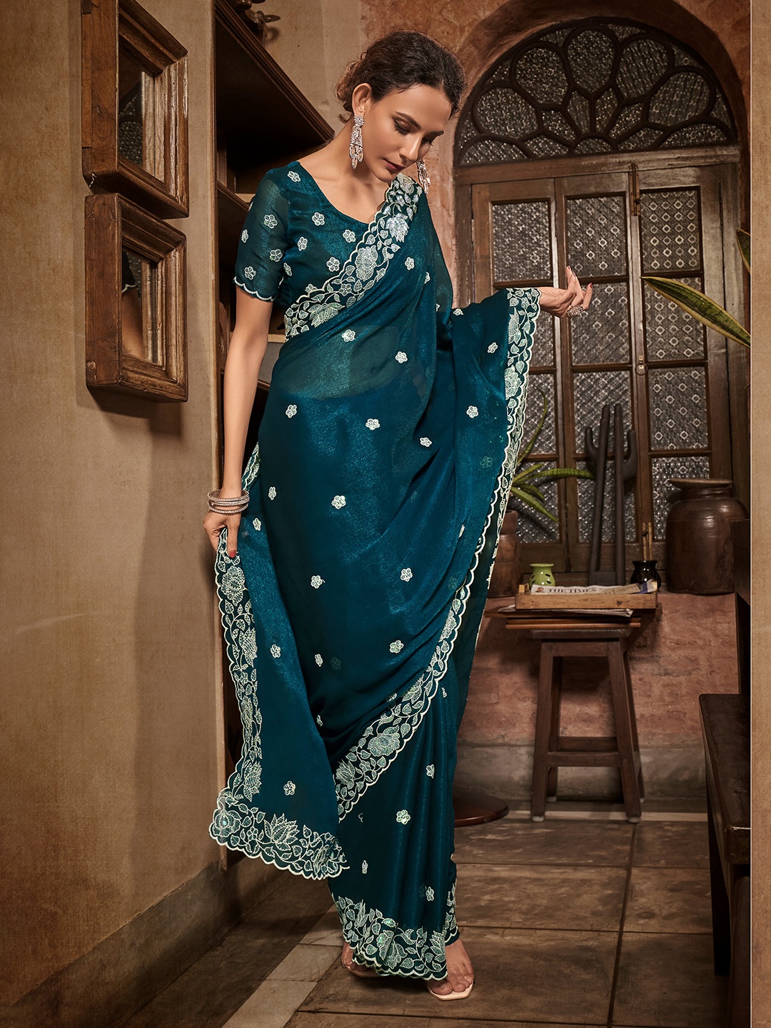 

Mitera Teal Floral Embroidered Sequinned Pure Chiffon Saree