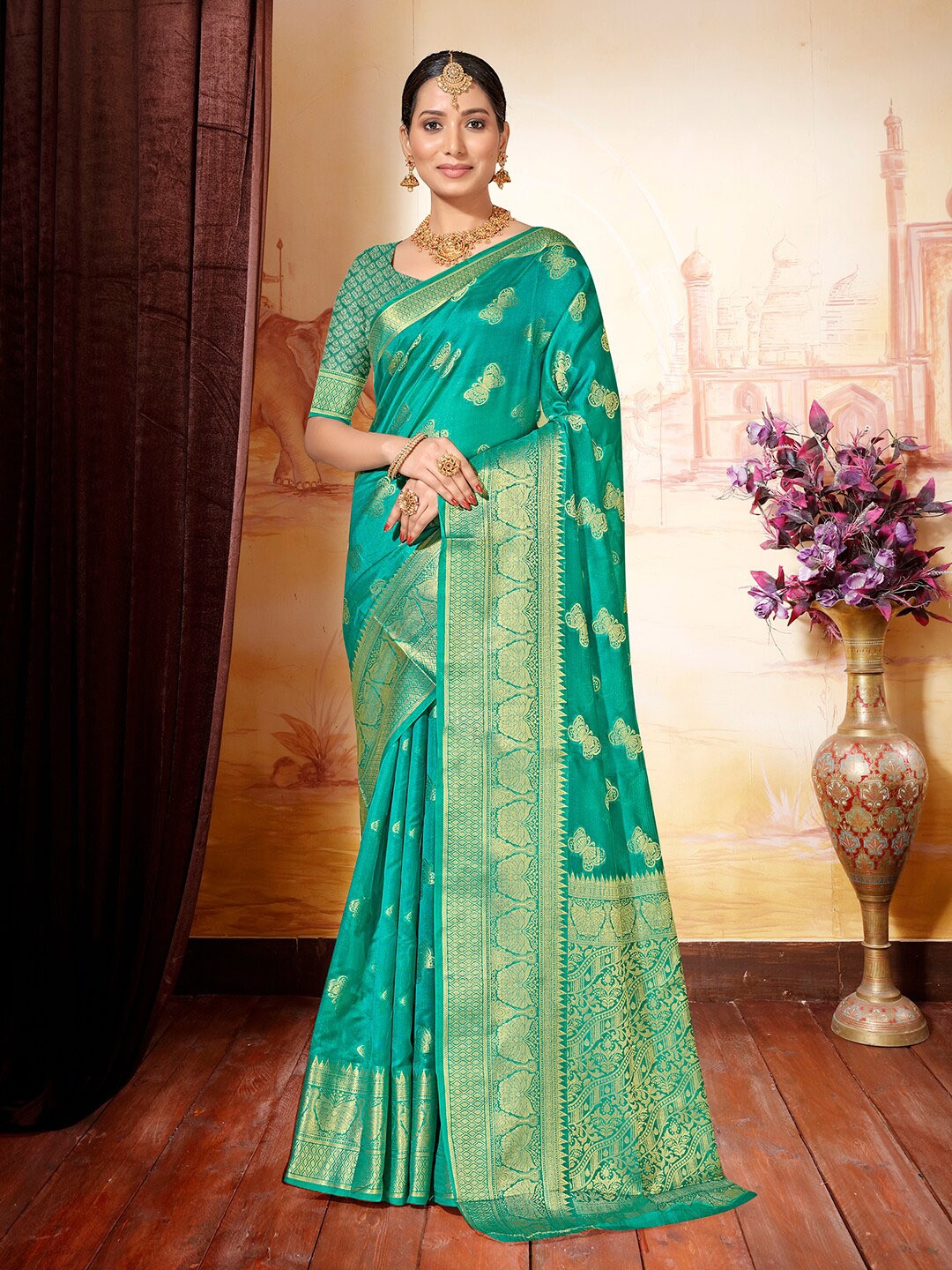 

Anouk Ethnic Motifs Woven Design Zari Organza Saree, Turquoise blue