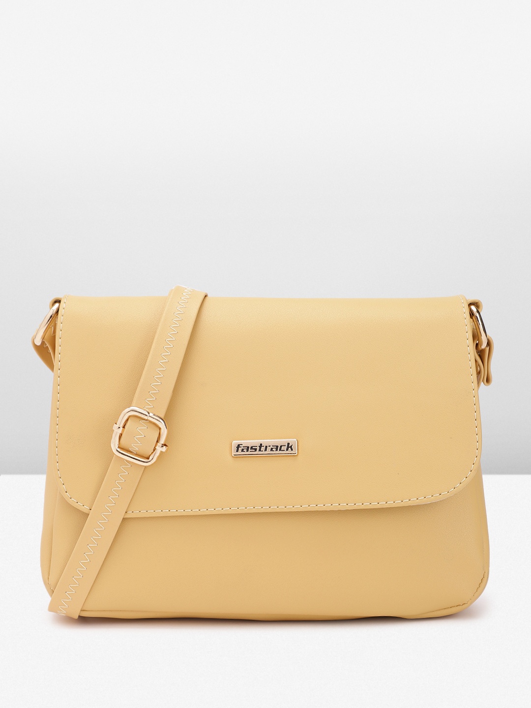 

Fastrack Women Solid Structured Sling Bag with Non-Detachable Sling Straps, Yellow