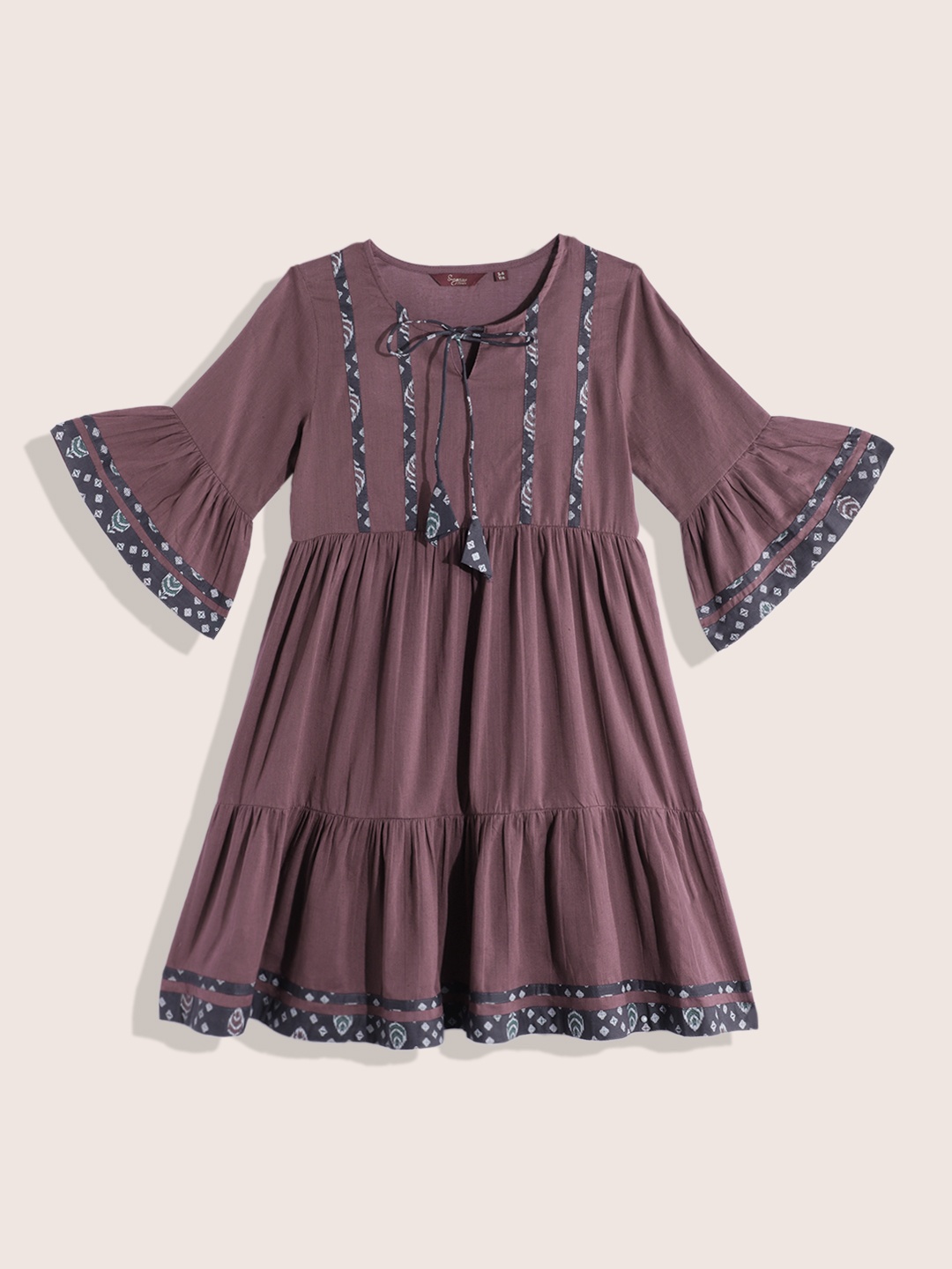 

Sangria Girls Ethnic Motifs Printed Detail Pure Cotton Tie-Up Neck Tiered A-Line Dress, Mauve