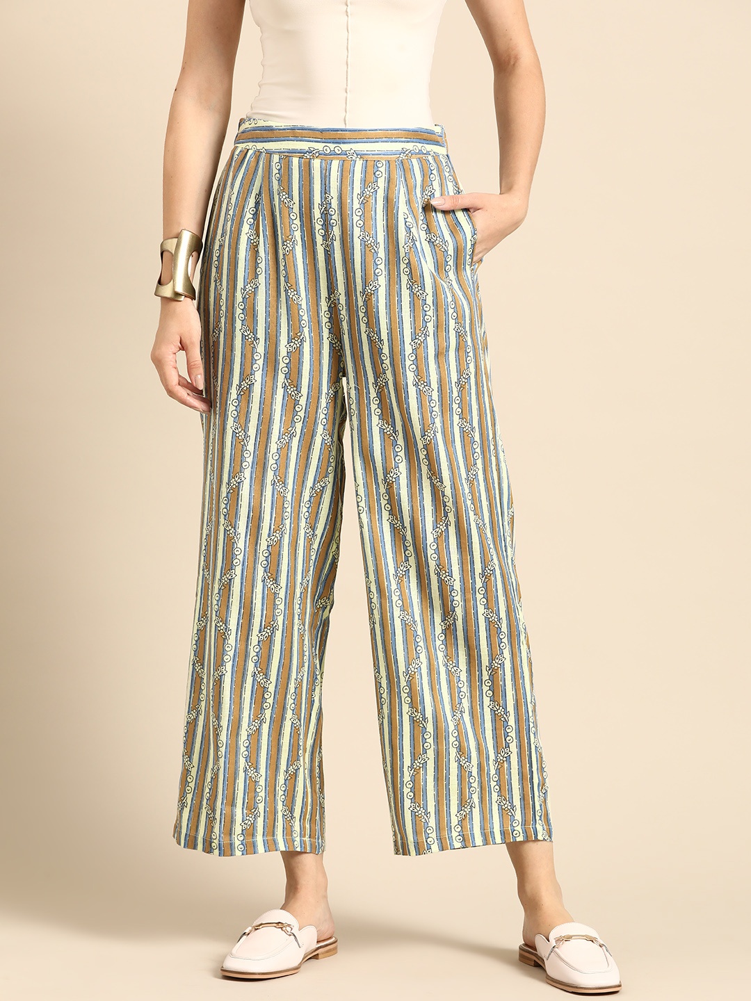 

Sangria Women Ethnic Motifs Printed Striped Flared Trousers, Brown