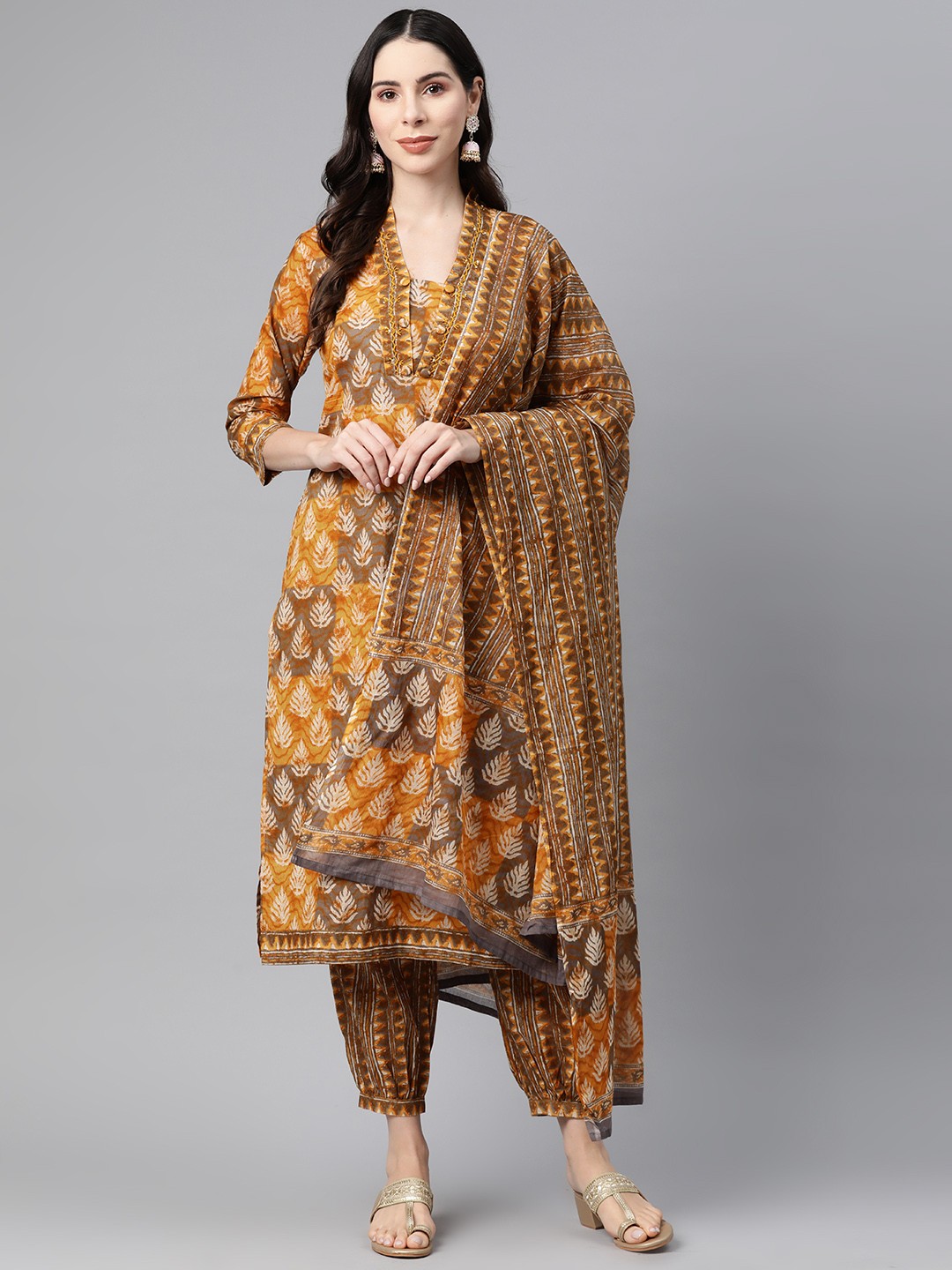 

Readiprint Fashions Ethnic Motifs Printed Thread Work Pure Cotton Kurta Set, Mustard