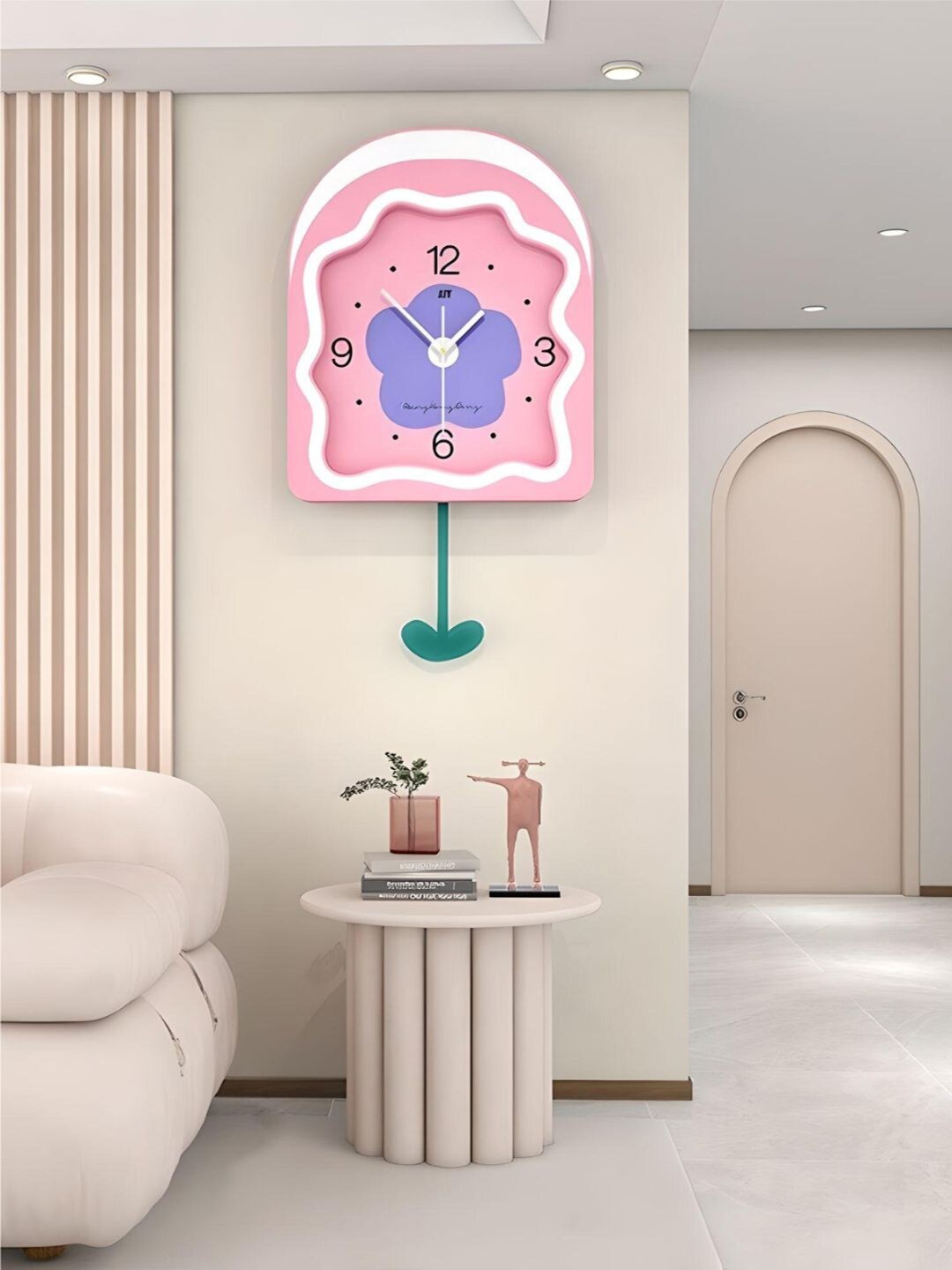 

The Art House Pink Printed Abstract Shaped Contemporary Wall Clock