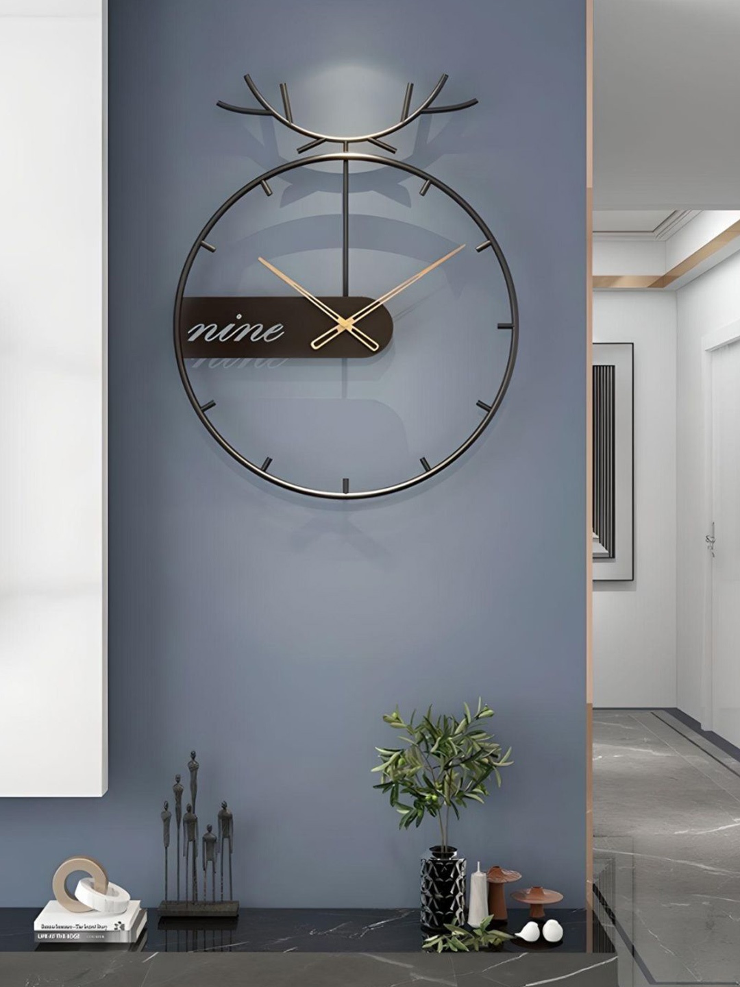 

The Art House Black Round Shaped Analogue Wall Clock