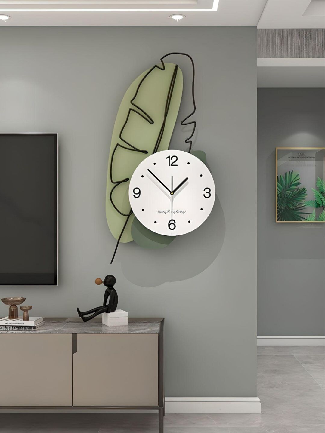 

The Art House White & Green Leaf Shaped Contemporary Wall Clock