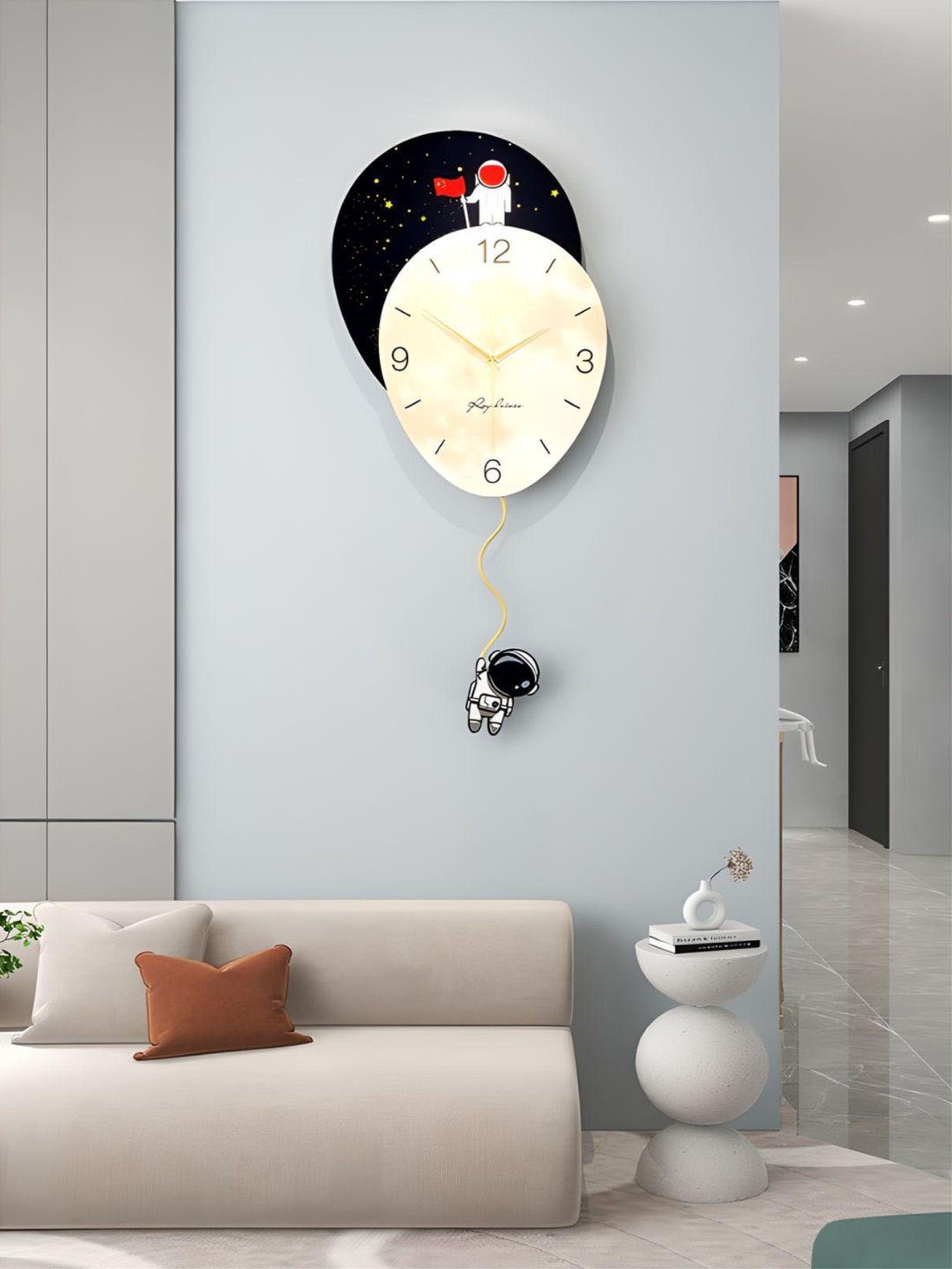 

The Art House Beige & Black Printed Abstract Shaped Contemporary Wall Clock