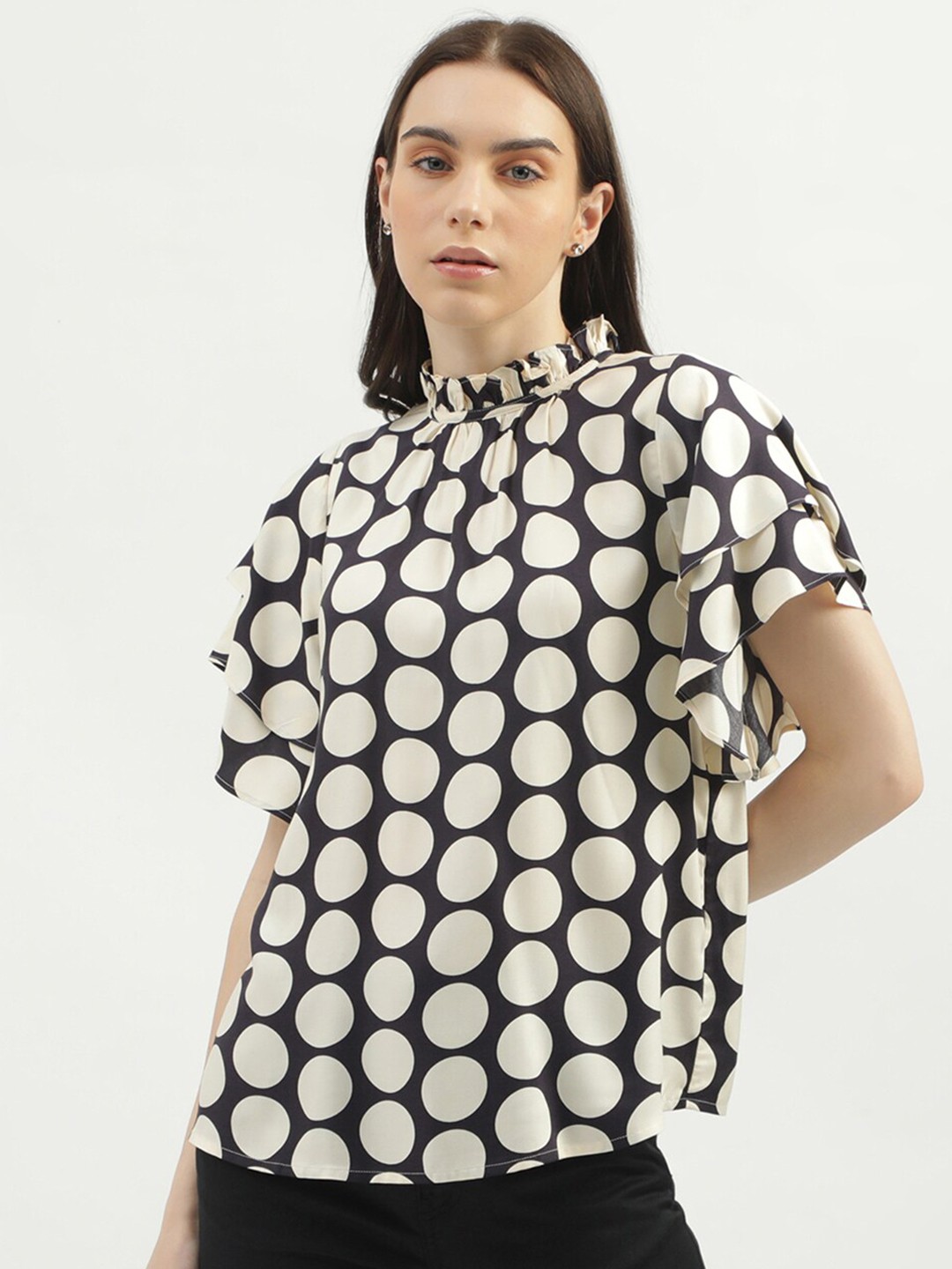 

United Colors of Benetton Polka Dots Printed High Neck Flutter Sleeves Top, Beige