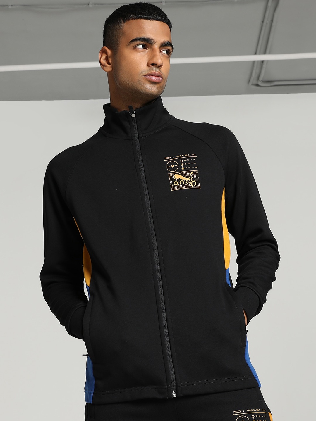 

one8 x PUMA Elevated Outdoor Colourblocked Patchwork Detail Cotton Sporty Jacket, Black