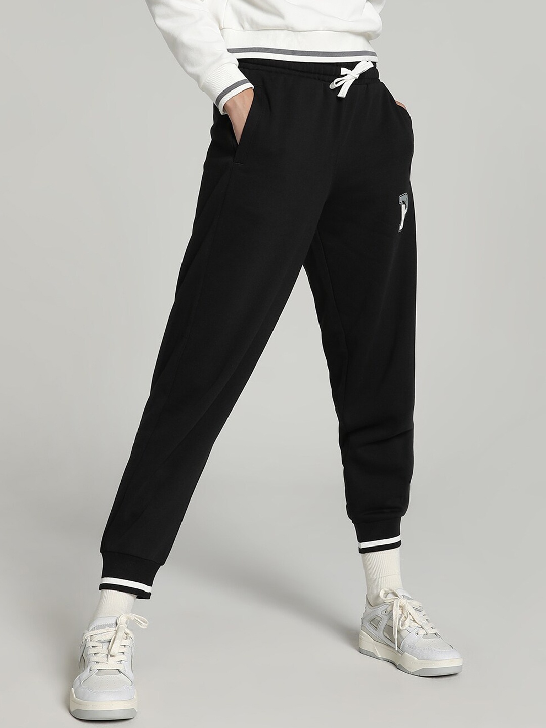 

Puma Women SQUAD Sweatpants Joggers, Black