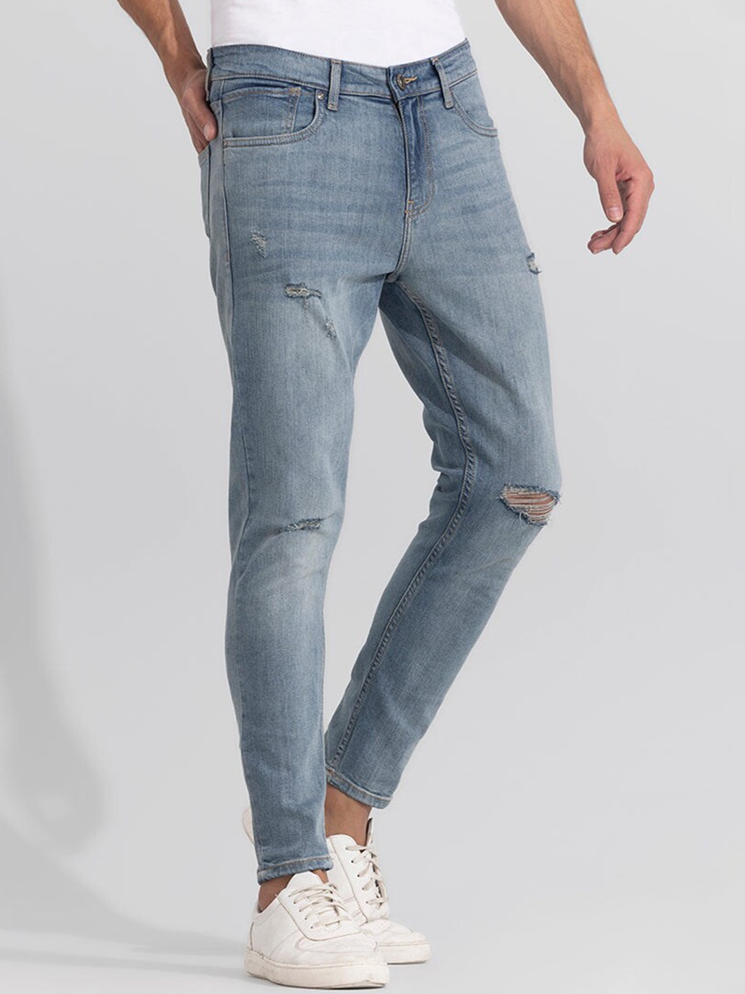 

Snitch Men Blue Skinny Fit Mildly Distressed Light Fade Stretchable Jeans