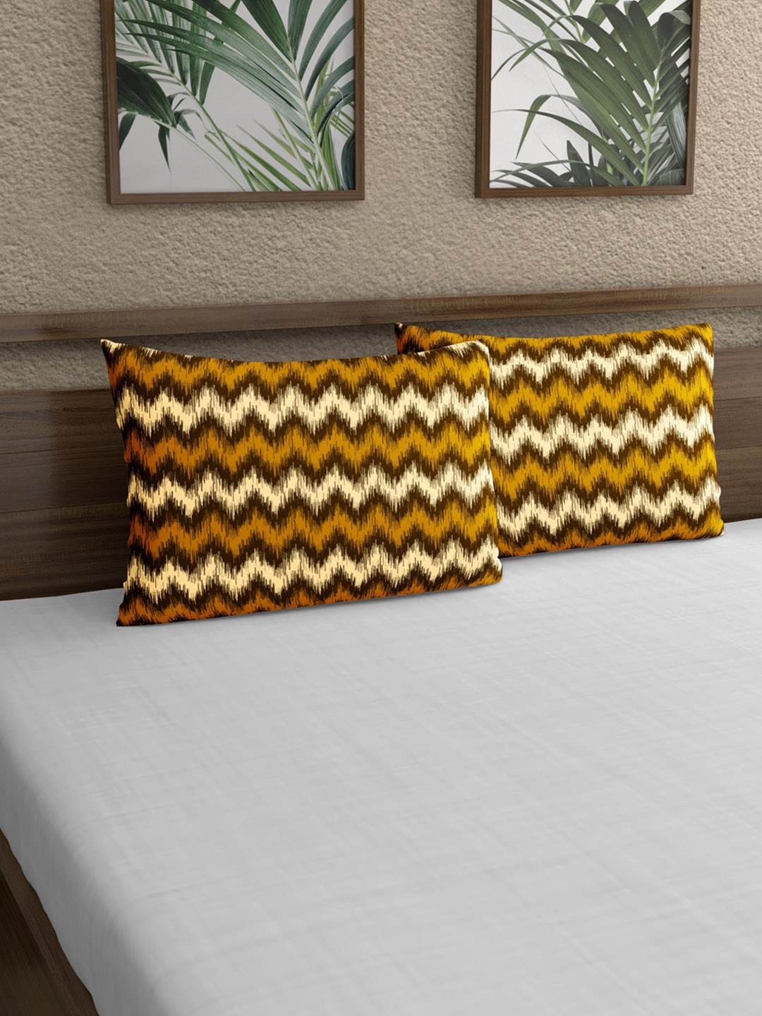 

Home Ecstasy Mustard Yellow 2 Pieces Printed 140 TC Pure Cotton Pillow Covers