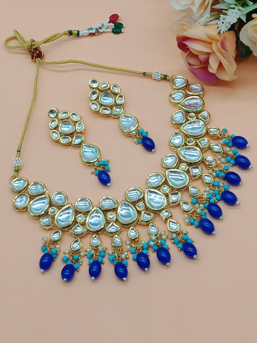 

AASHISH IMITATION Gold Plated Kundan Studded & Beaded Jewellery Set