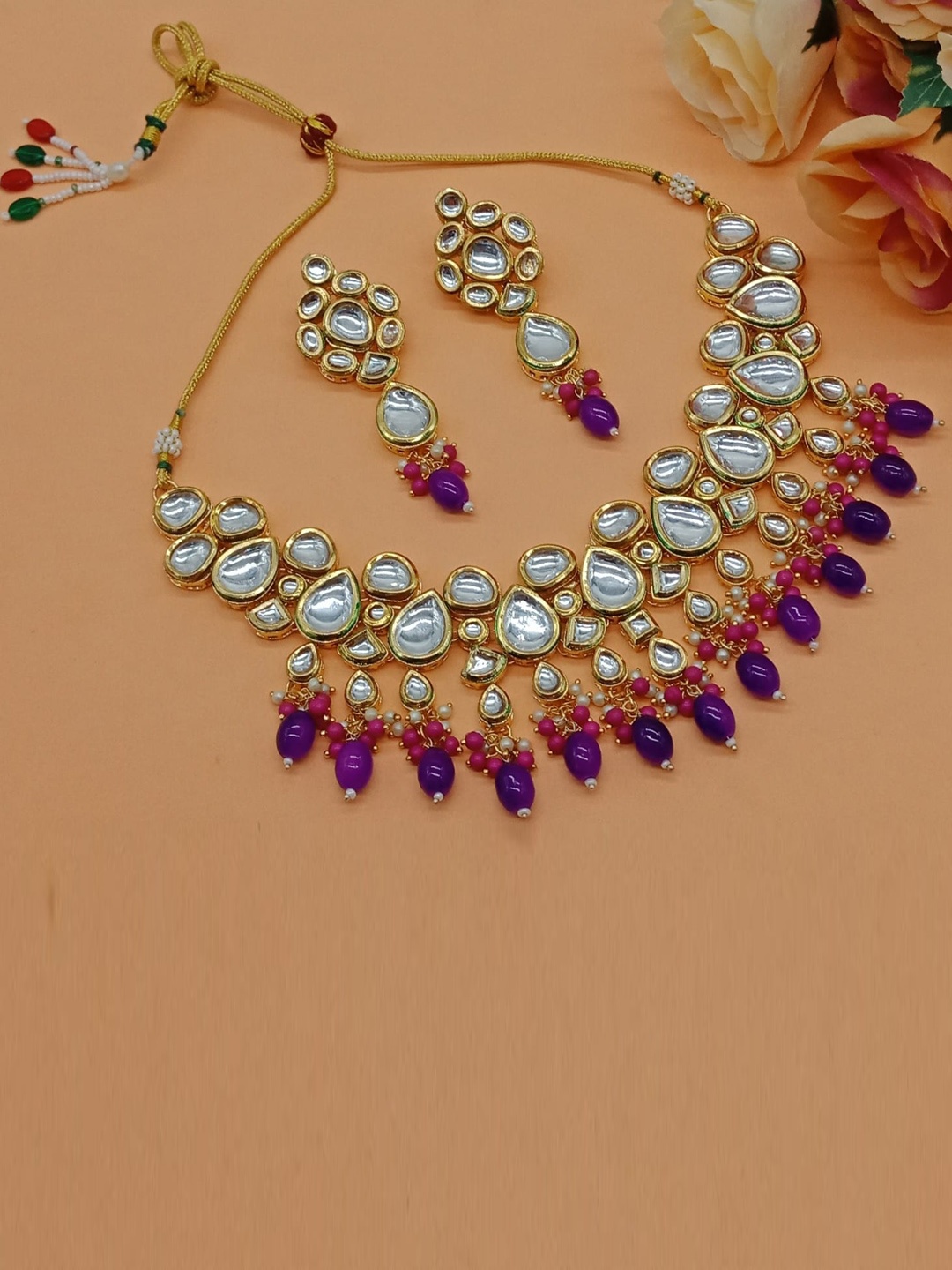 

AASHISH IMITATION Gold Plated Kundan Studded & Beaded Jewellery Set