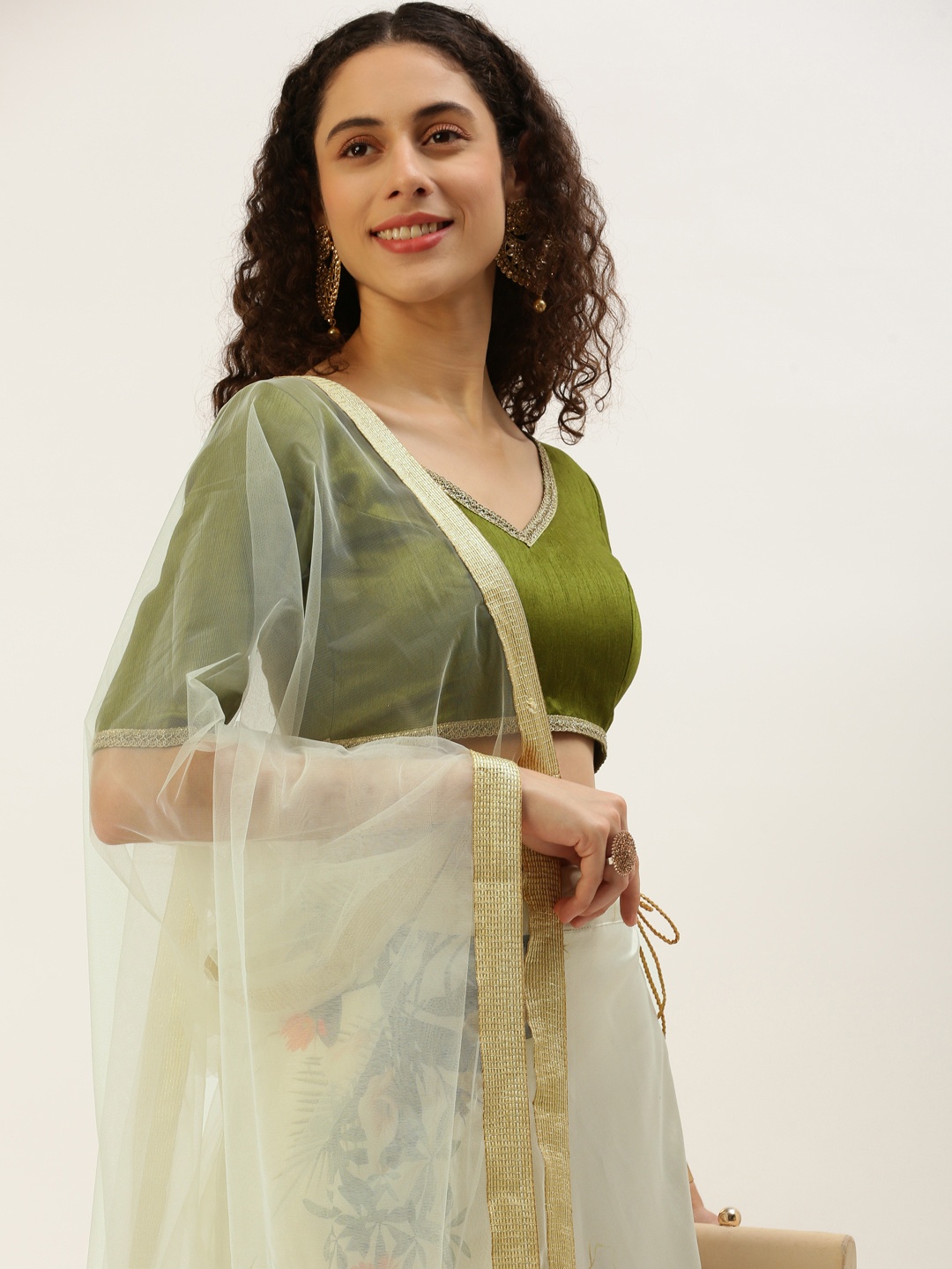 

LOOKNBOOK ART Off White & Green Semi-Stitched Lehenga & Unstitched Blouse With Dupatta