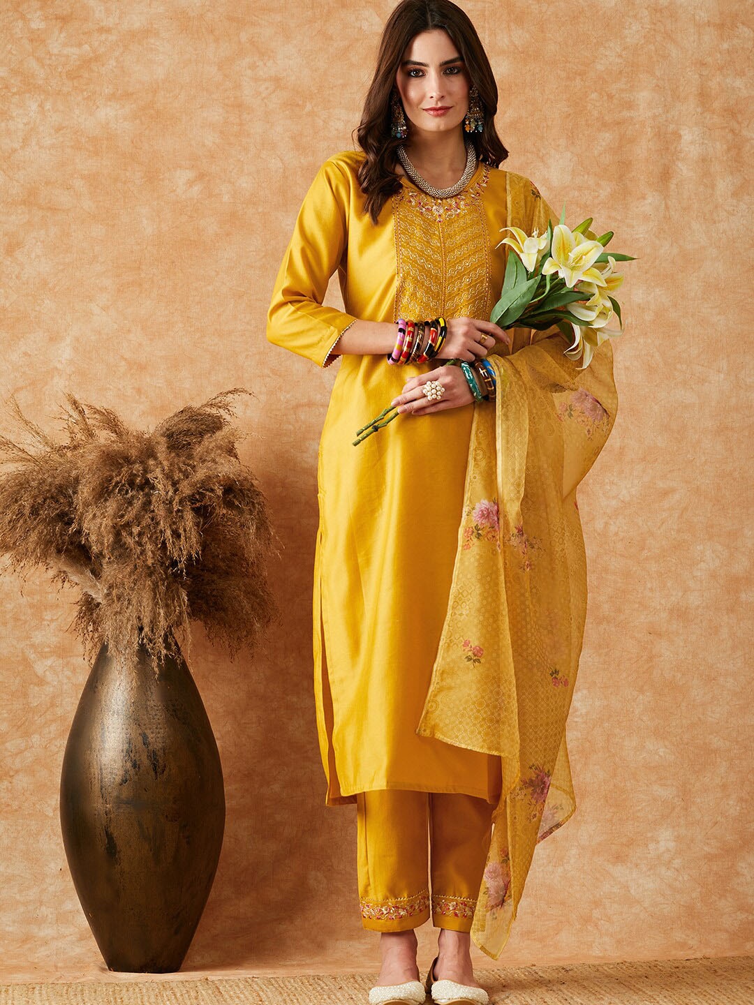 

Sangria Yellow Ethnic Motifs Embroidered Sequinned Kurta With Trouser & Dupatta