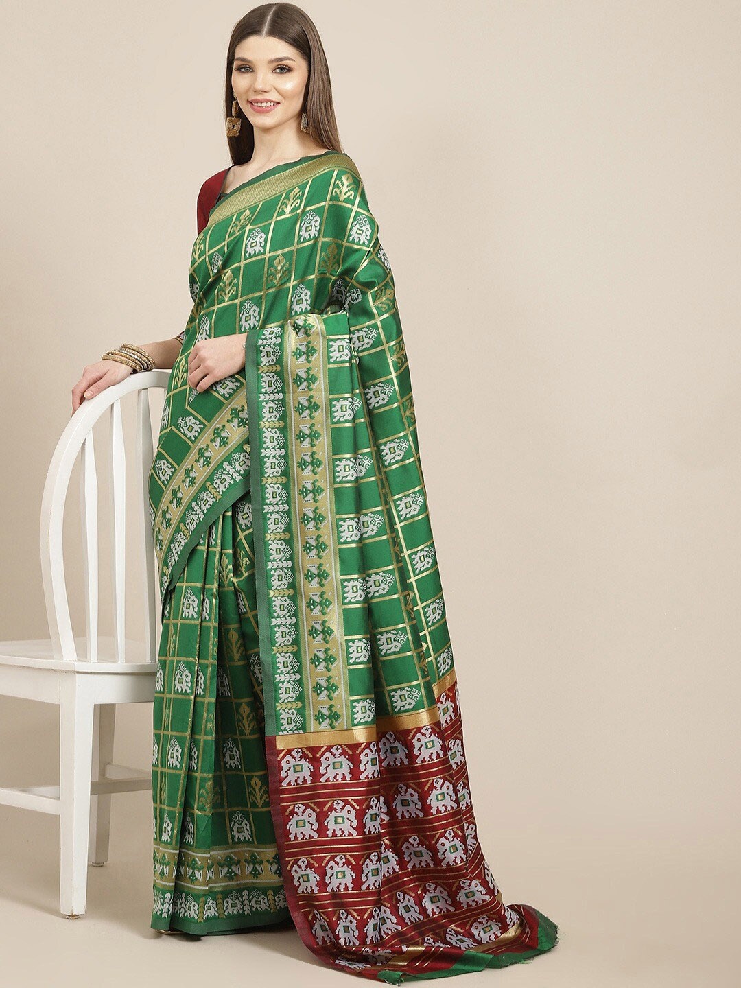

Mitera Ethnic Motifs Woven Design Zari Patola Saree, Green