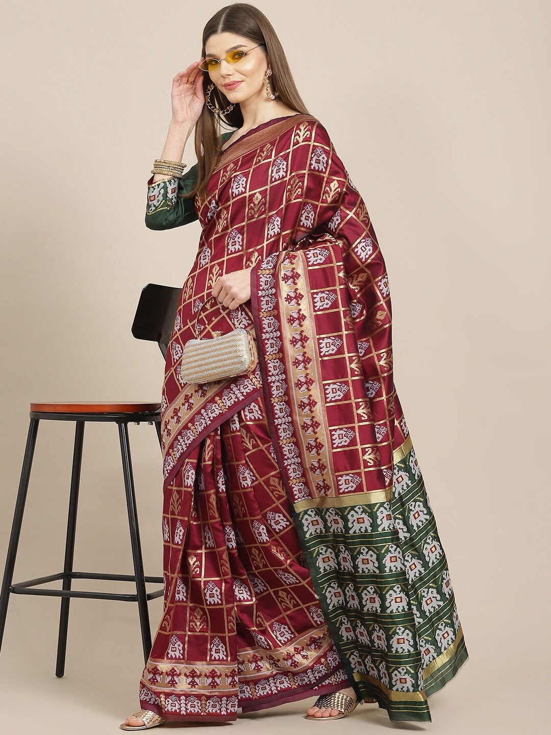 

Mitera Ethnic Motifs Woven Design Zari Patola Saree, Maroon