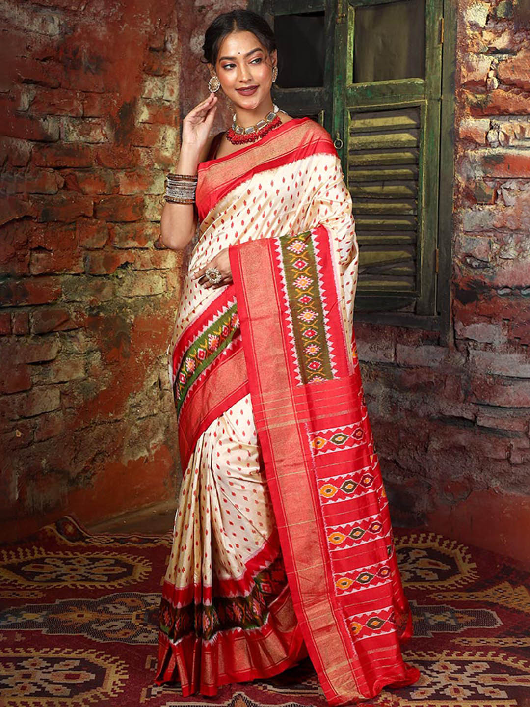 

AllSilks White & Red Ethnic Motifs Zari Pure Silk Pochampally Saree