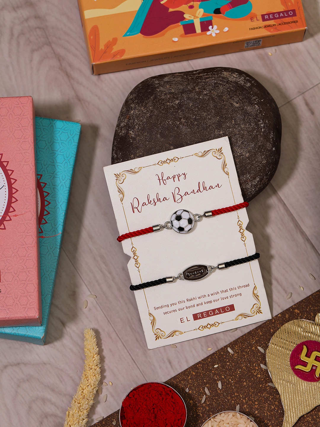 

EL REGALO Bhaiya Bhabhi Set Of 2 Charm Rakhi Combo With Roli Chawal, Red